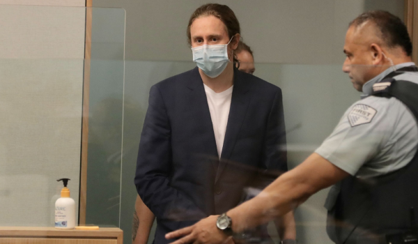 Xavier Valent enters the dock on the first day of his trial at the Auckland High Court. Photo / Michael Craig