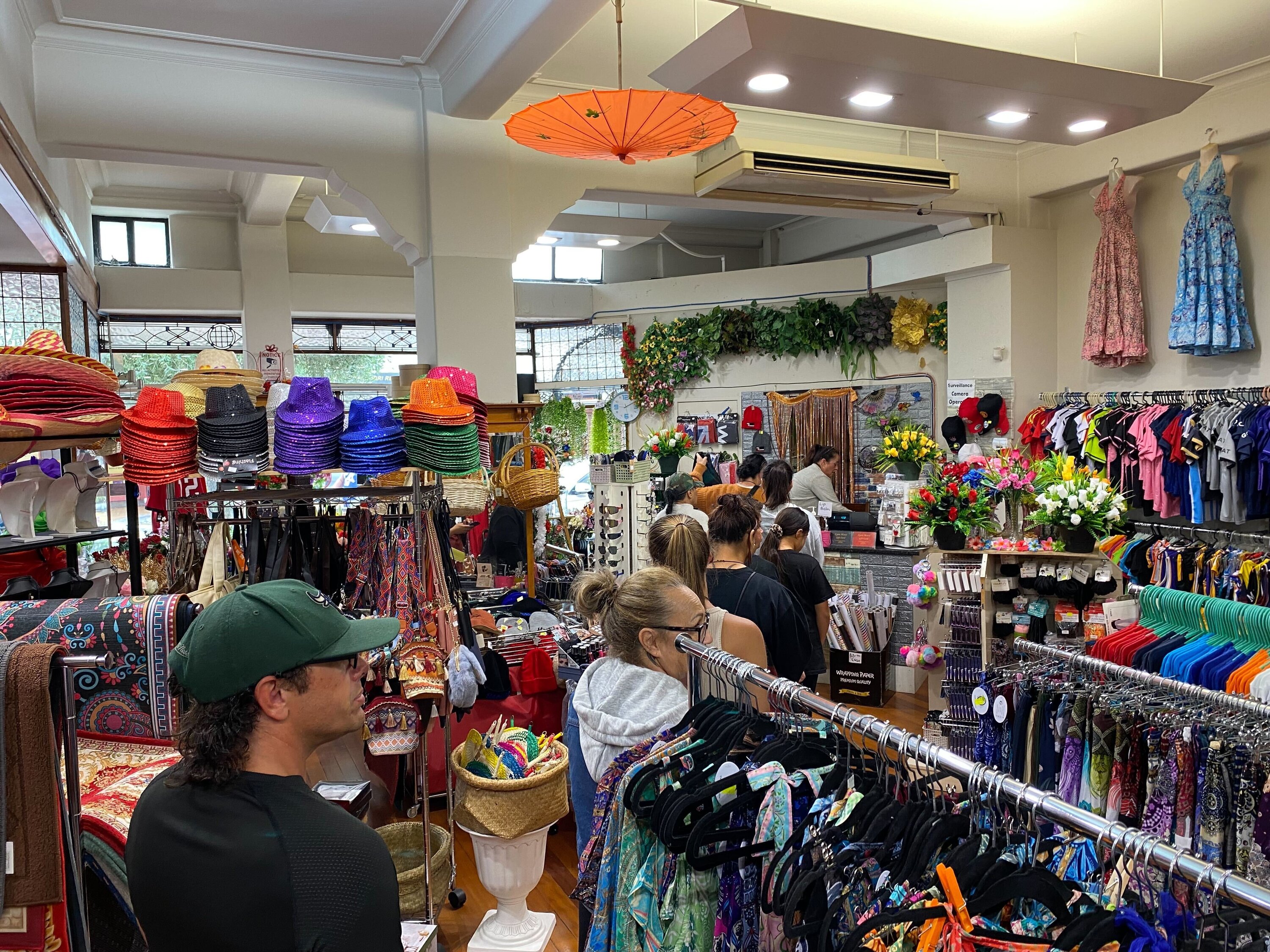 People line up to buy tino rangatiratanga flags at Lynn House in Hastings before the hīkoi arrived in Hawke's Bay. Photo / Jack Riddell