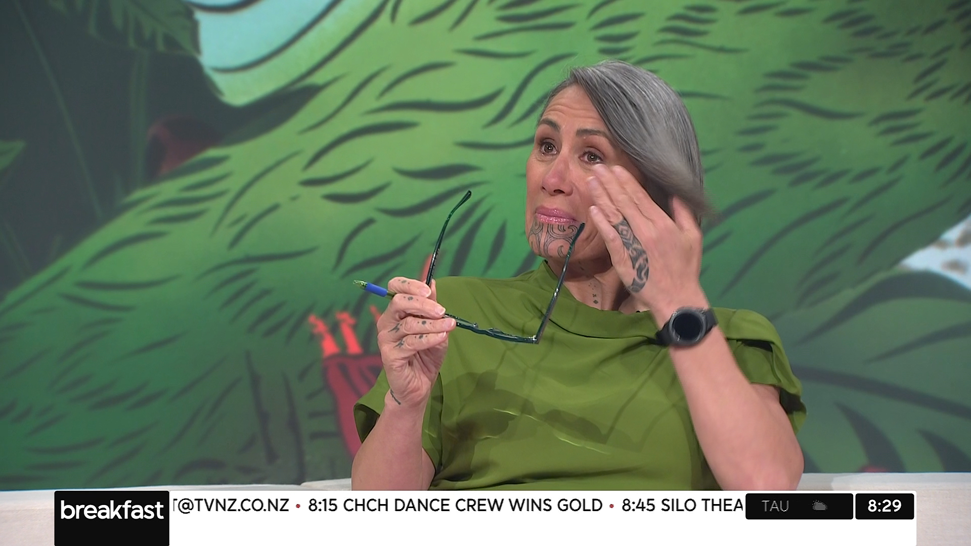 Jenny-May Clarkson brushes away tears as tributes are read to her on Friday's Breakfast show. Photo / TVNZ
