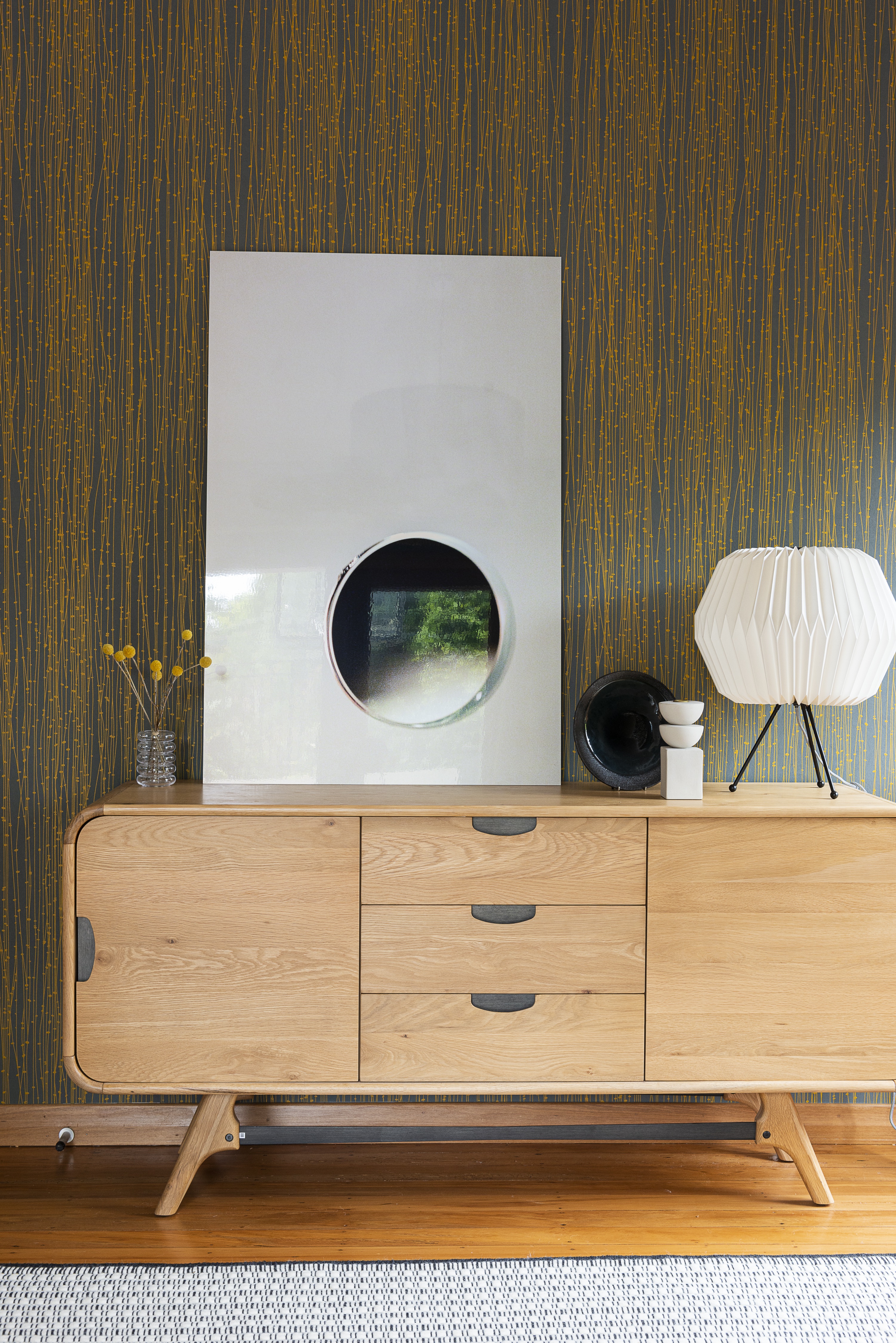 Maintain comfort in living and dining areas by investing in furniture pieces that offer both storage and style. Designer sideboards and vintage cabinets are perfect for concealing clutter while adding character to the room. Photo / Cave Bureau