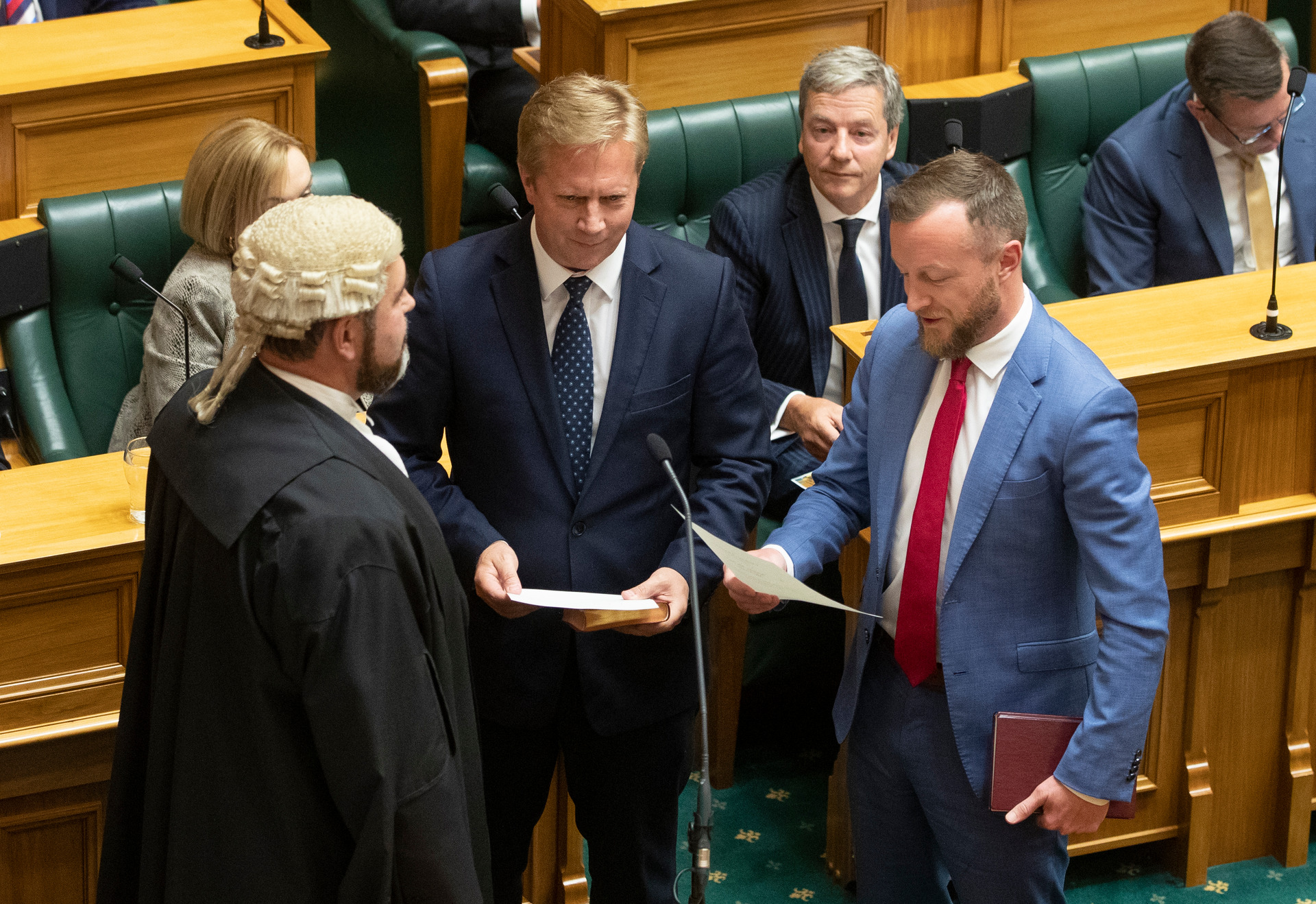 National MP Todd McClay (left) and Labour MP Kieran McAnulty swearing the oath. Photo / Mark Mitchell