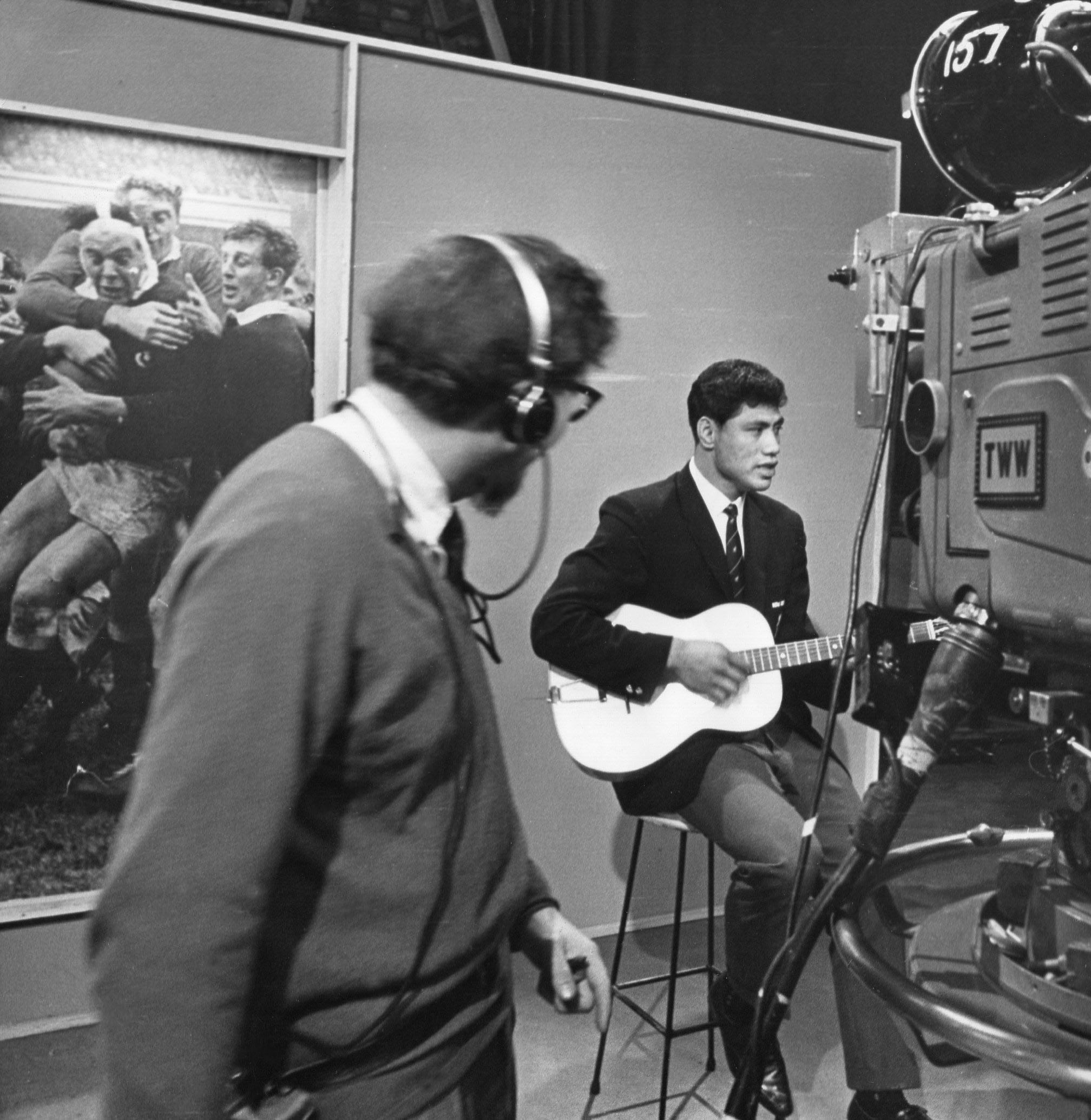 Waka Nathan singing for a TV show while playing his guitar. Photo / Supplied