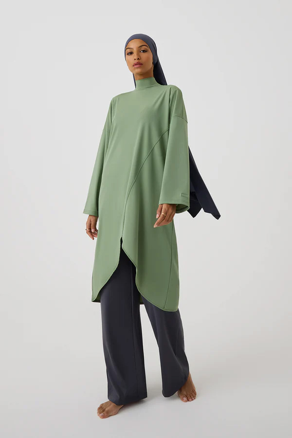 Lyra Modest's flowy full-coverage swimsuits are rendered in pleasant pastels. 