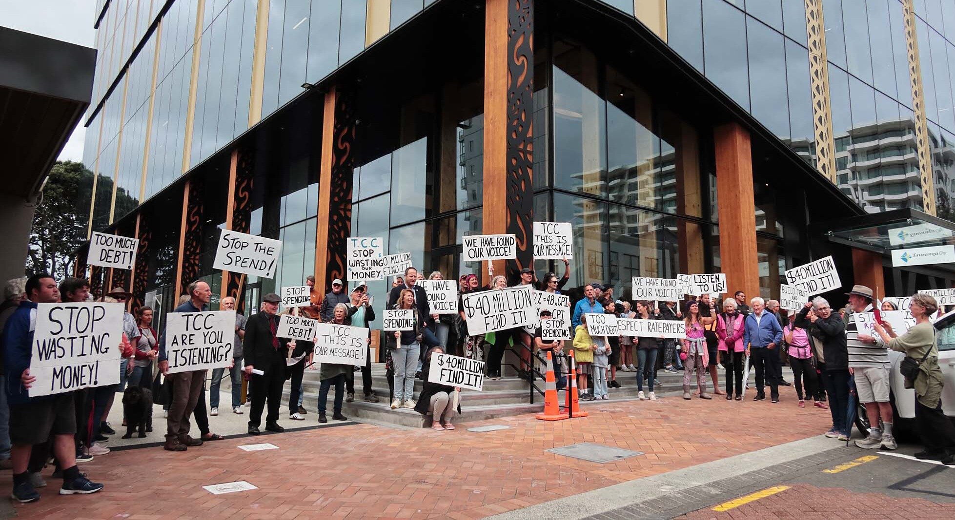 The rates rally held in Tauranga stopped outside the new council offices on Devonport Rd. Photo / Supplied
