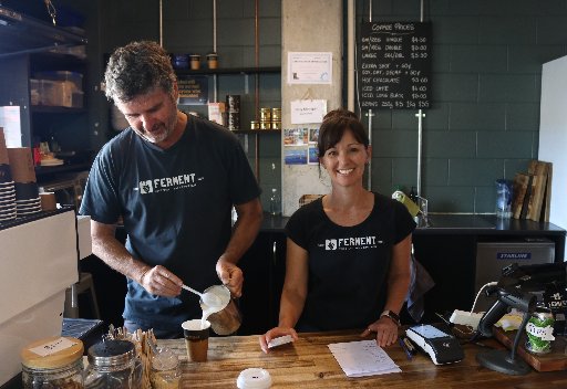 Steve White and Nikki Platt, of Ferment Cafe and Bar in Kerikeri, did a brisk trade in coffee thanks to a manual Eftpos terminal.  Photo / Peter de Graaf