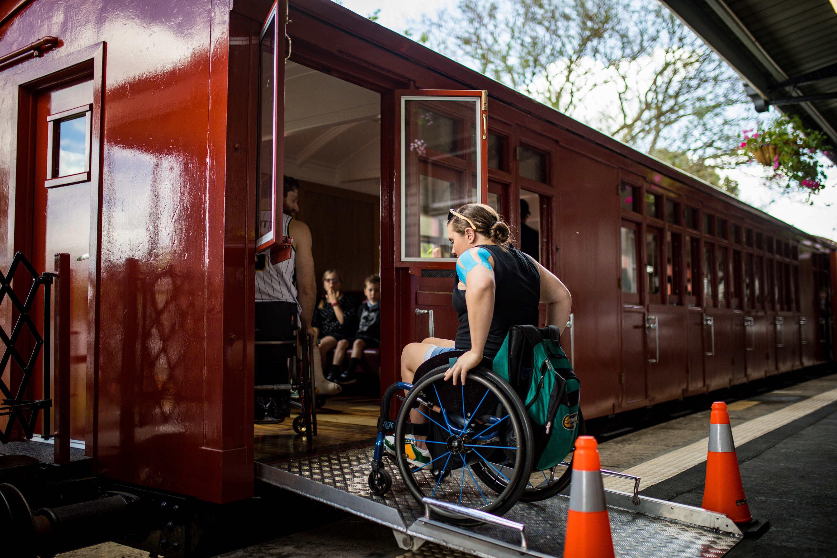 Paralympian Hannah Dodd and Steven Elliott get onboard the Mary valley Rattler's new all access carriage.
Photo / Supplied