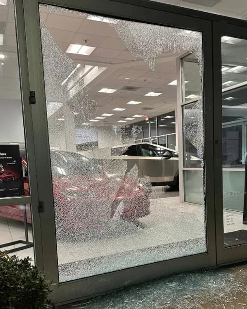 A damaged show window at a Telsa dealership in Salem, Oregon. Photo / United States District Court for the District of Oregon