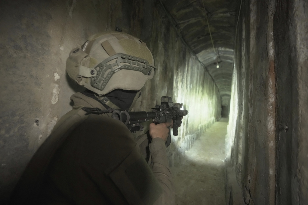Israeli soldiers in an underground tunnel found underneath Shifa Hospital in Gaza. Photo / AP