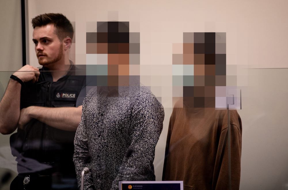 A pair with interim suppression appear in the North Shore District Court on July 1, 2024 charged with tampering with the body of an unidentified woman found in the water off Gulf Harbour on March 12. Photo / Dean Purcell