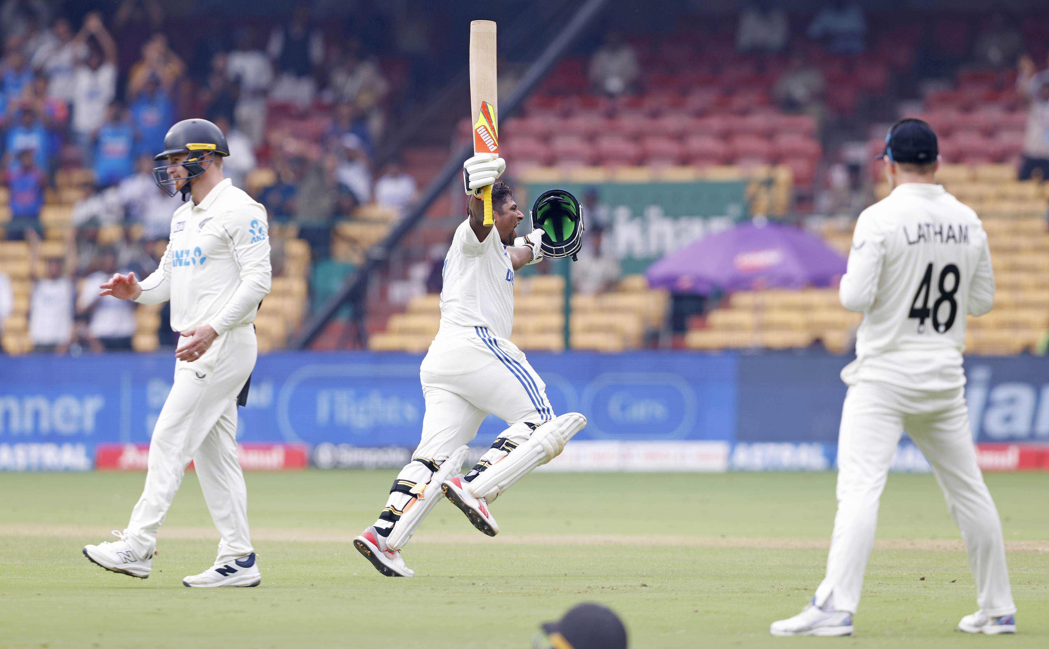 Sarfaraz Khan celebrates his maiden test hundred. Photo / Photosport