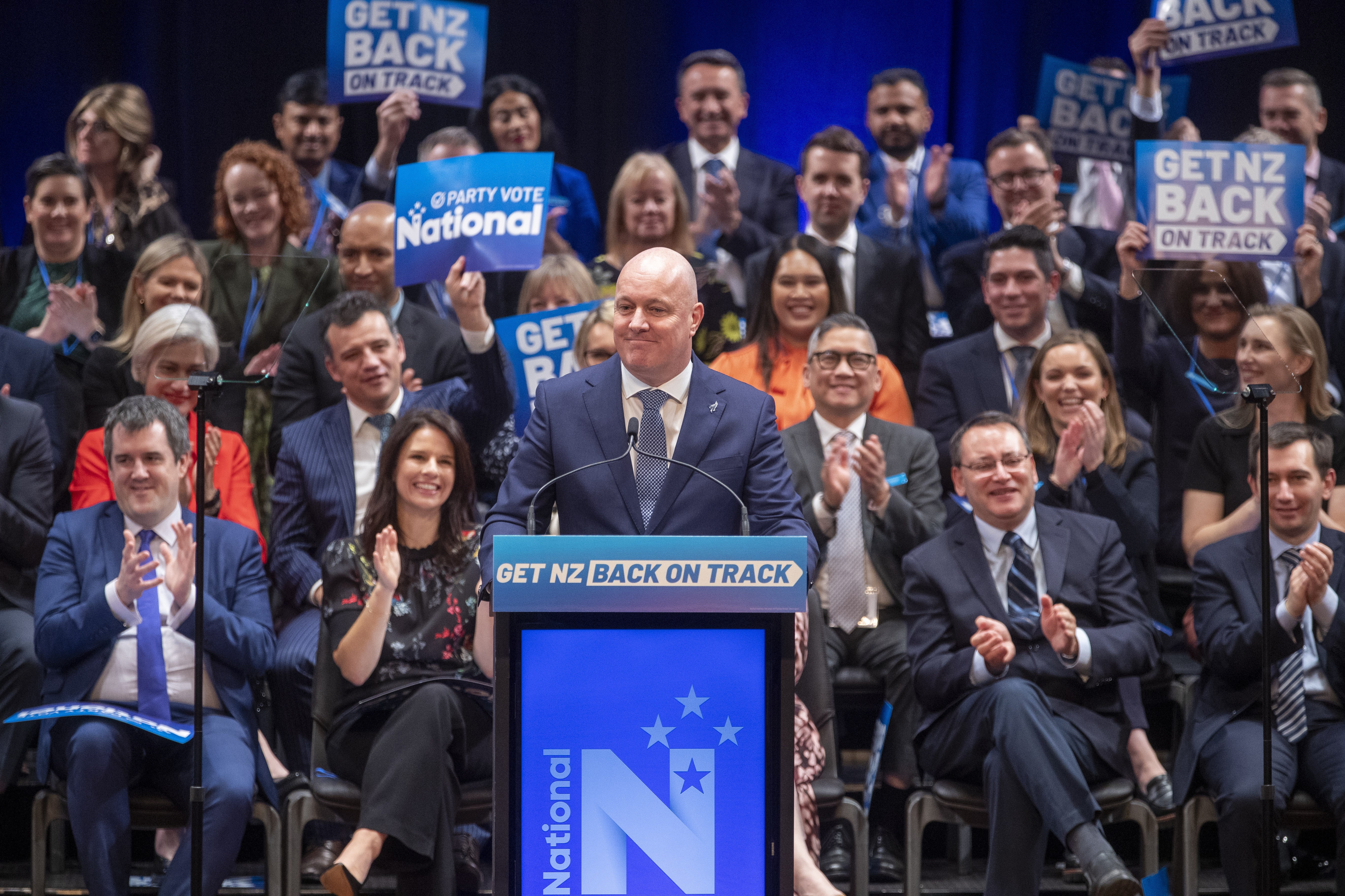 National leader Christopher Luxon in front of MPs and candidates during his speech at the party's annual conference at the Michael Fowler Centre in Wellington. Photo / Mark Mitchell