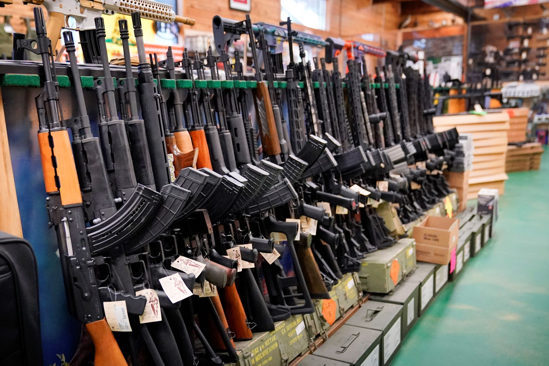 Semi-automatic rifles displayed at a Maine store. President Joe Biden and the Democrats have become increasingly emboldened in pushing for stronger gun control. Photo / AP