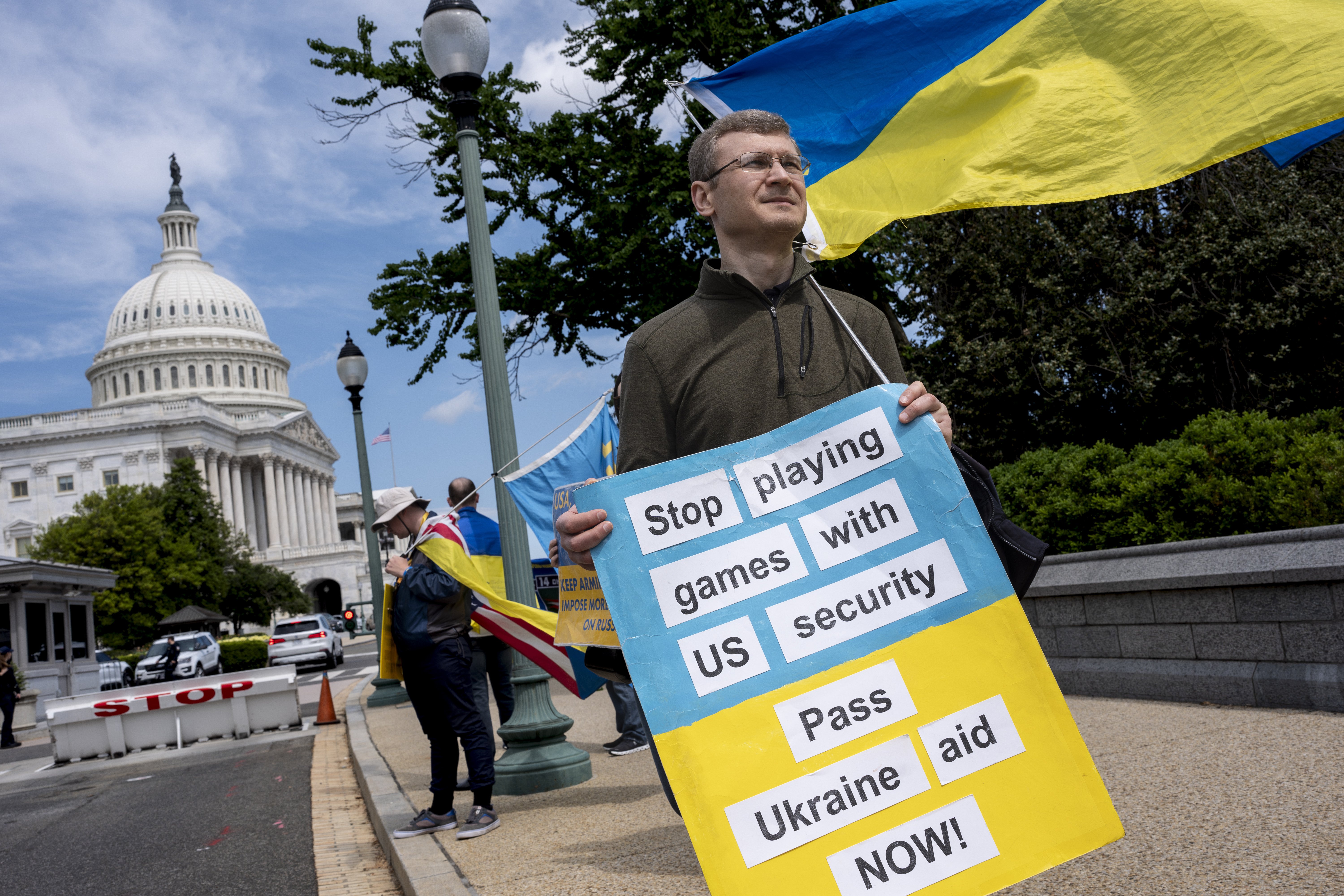 Activists supporting Ukraine demonstrate outside the Capitol. Photo / AP