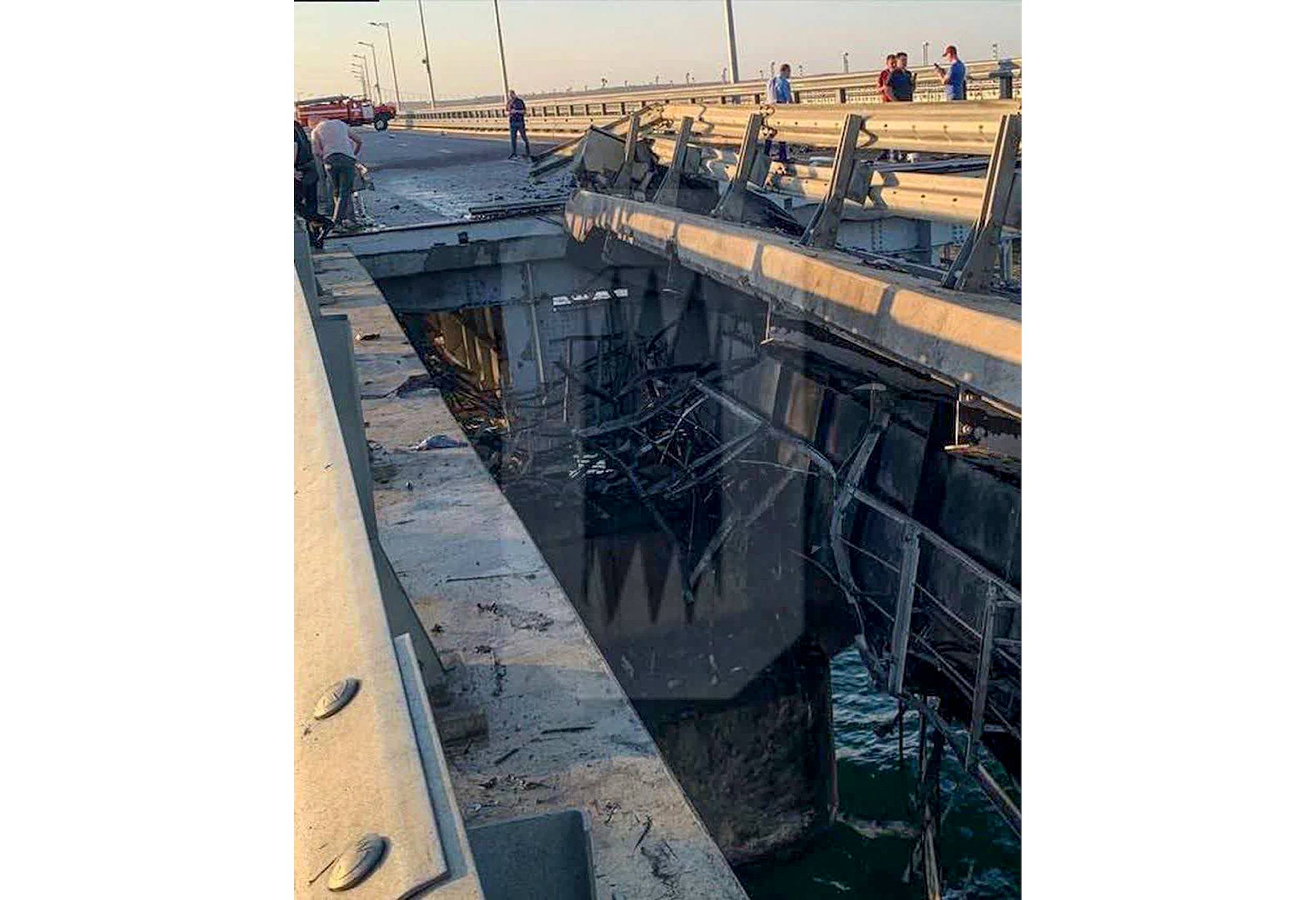 This photo released by Ostorozhno Novosti reportedly shows damage to the bridge connecting the Russian mainland and the Crimean Peninsula. Photo / AP