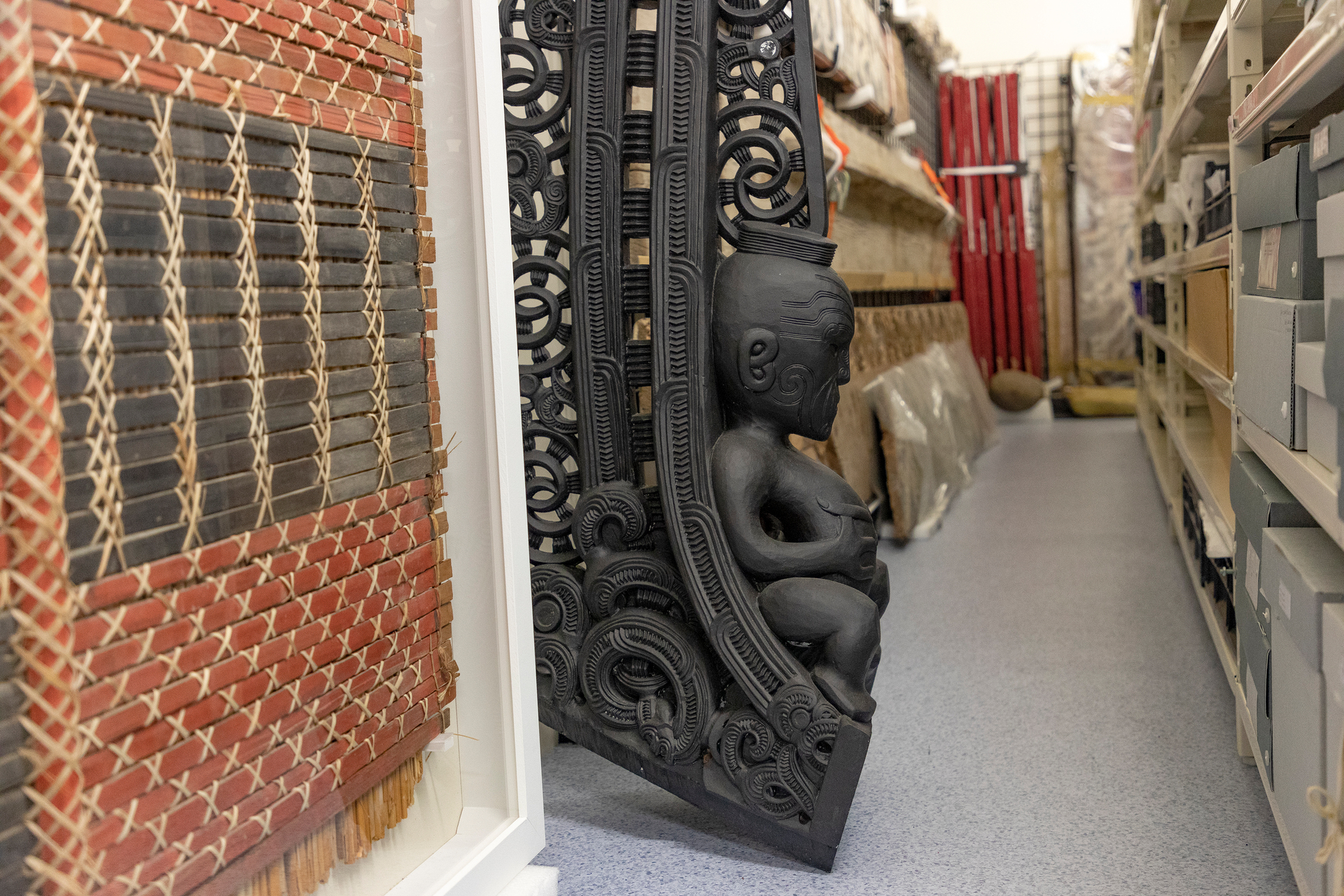 Part of the Awanui canoe sits in storage after being restored. Photo / Andrew Warner