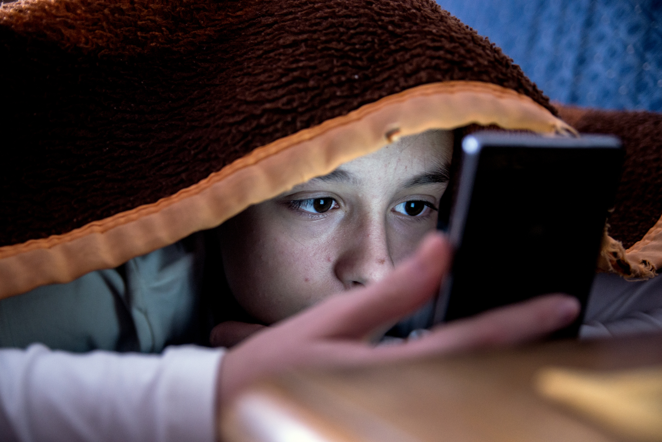 Sextortion is on the rise in New Zealand with advancements in AI deepfakes also posing a threat. Photo / Getty Images.
