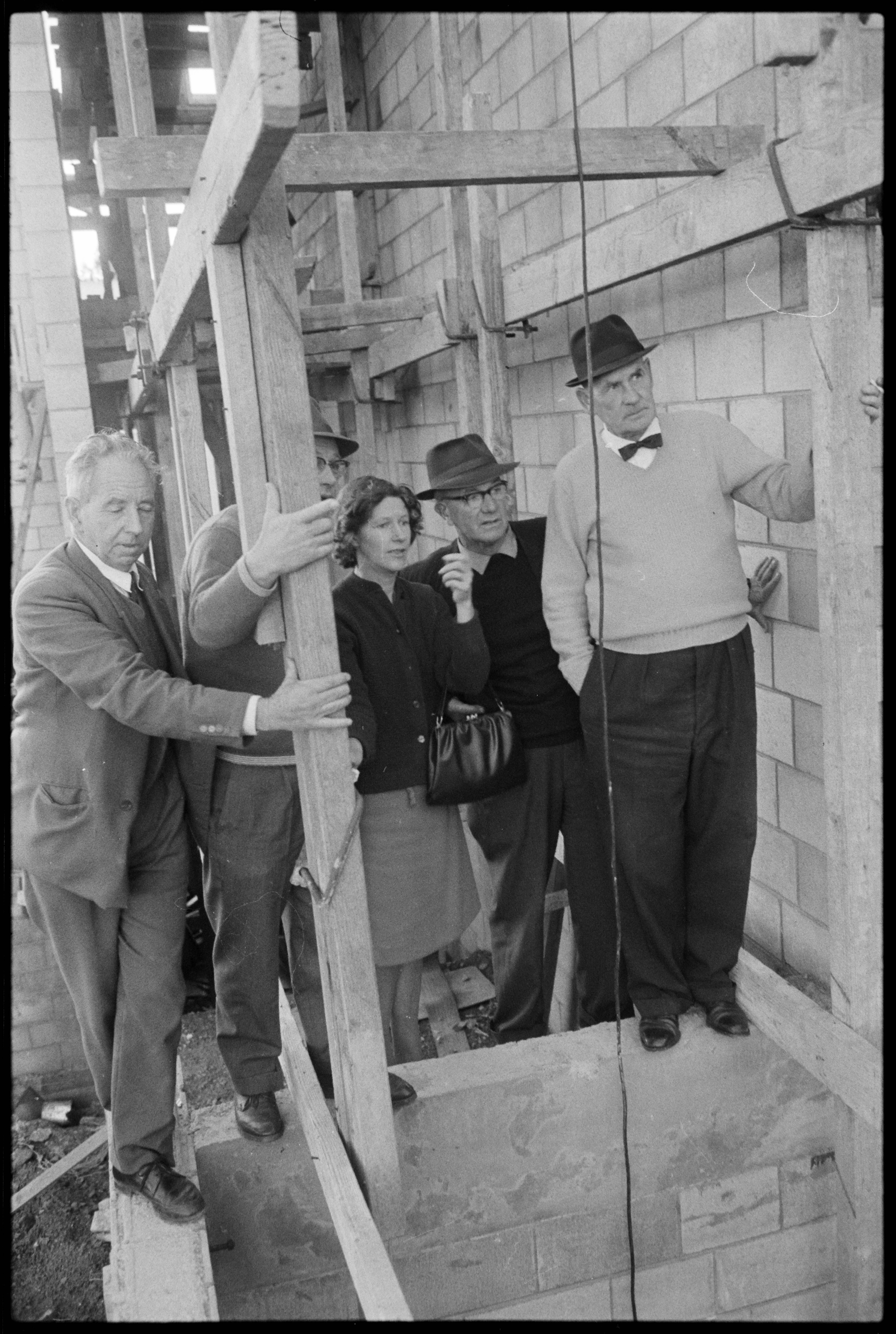 Councillors inspect the Queen Elizabeth Youth Centre during its construction. Original photo published June 10, 1966.