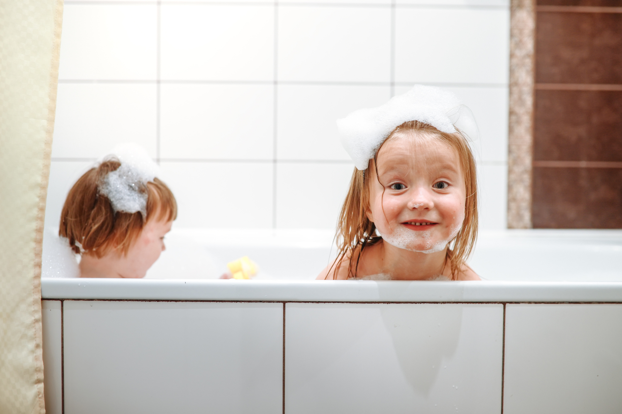 Children's skin can be particularly sensitive to harsh ingredients in bath products and skincare, so it's important to choose your ingredients wisely, says a skin expert. Photo / Getty Images.