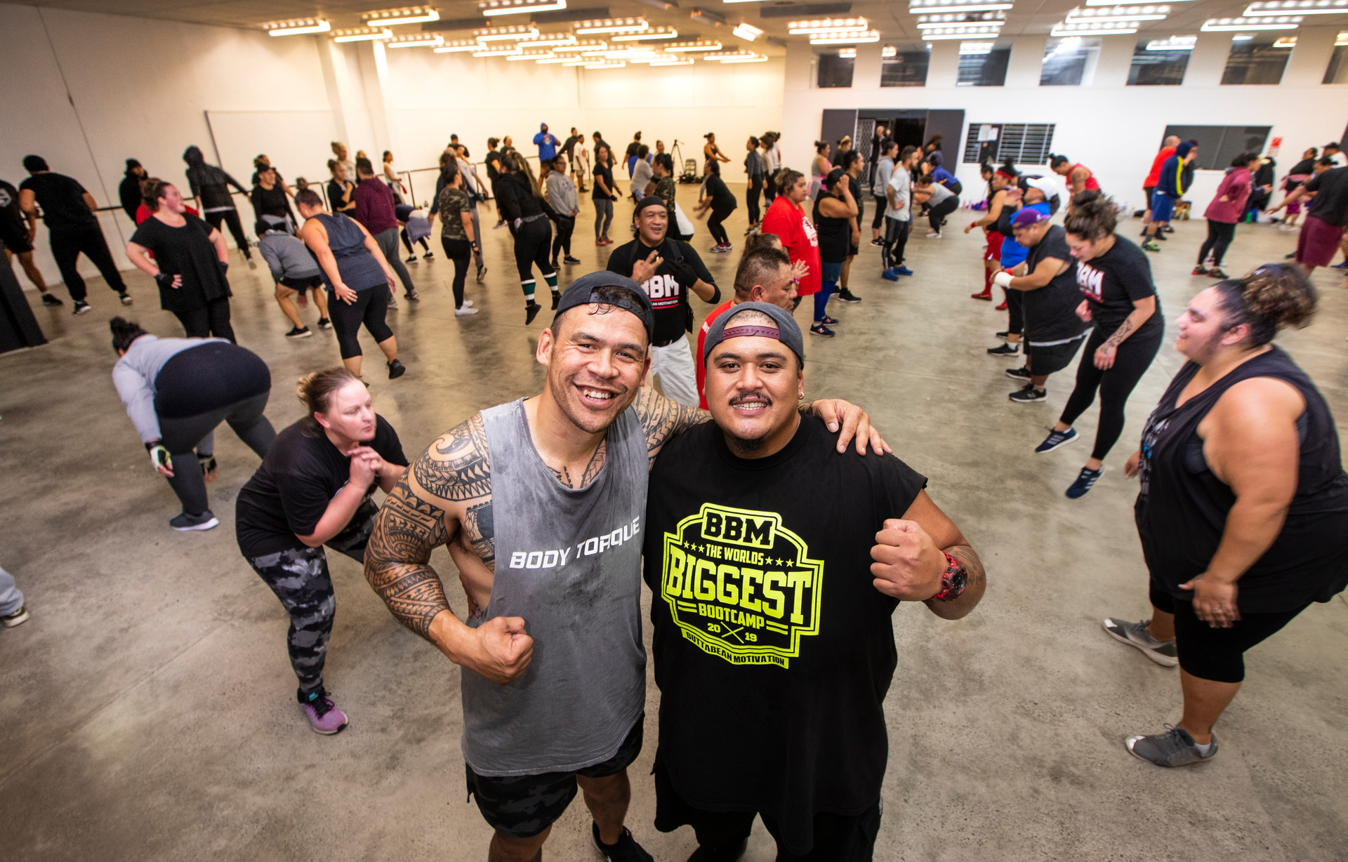 David Letele (left), aka The Brown Buttabean, with Philip Tele'a at community-based boot camp BBM in Manukau. Photo / Brett Phibbs