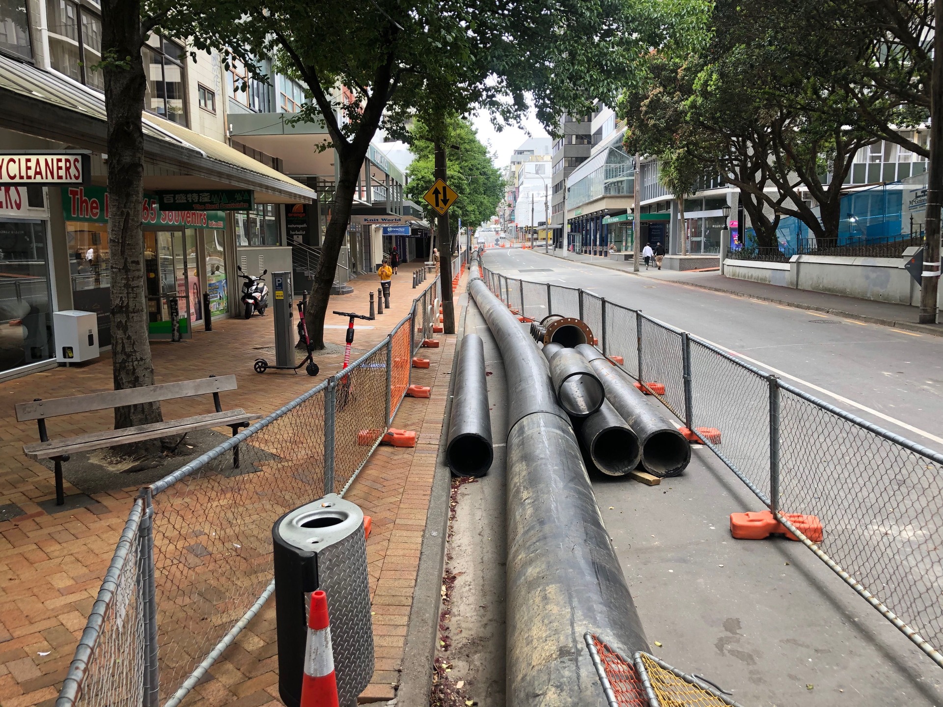 Wastewater is flowing through an above ground bypass on Willis street after a pipe collapsed just before Christmas. Photo / Georgina Campbell. 