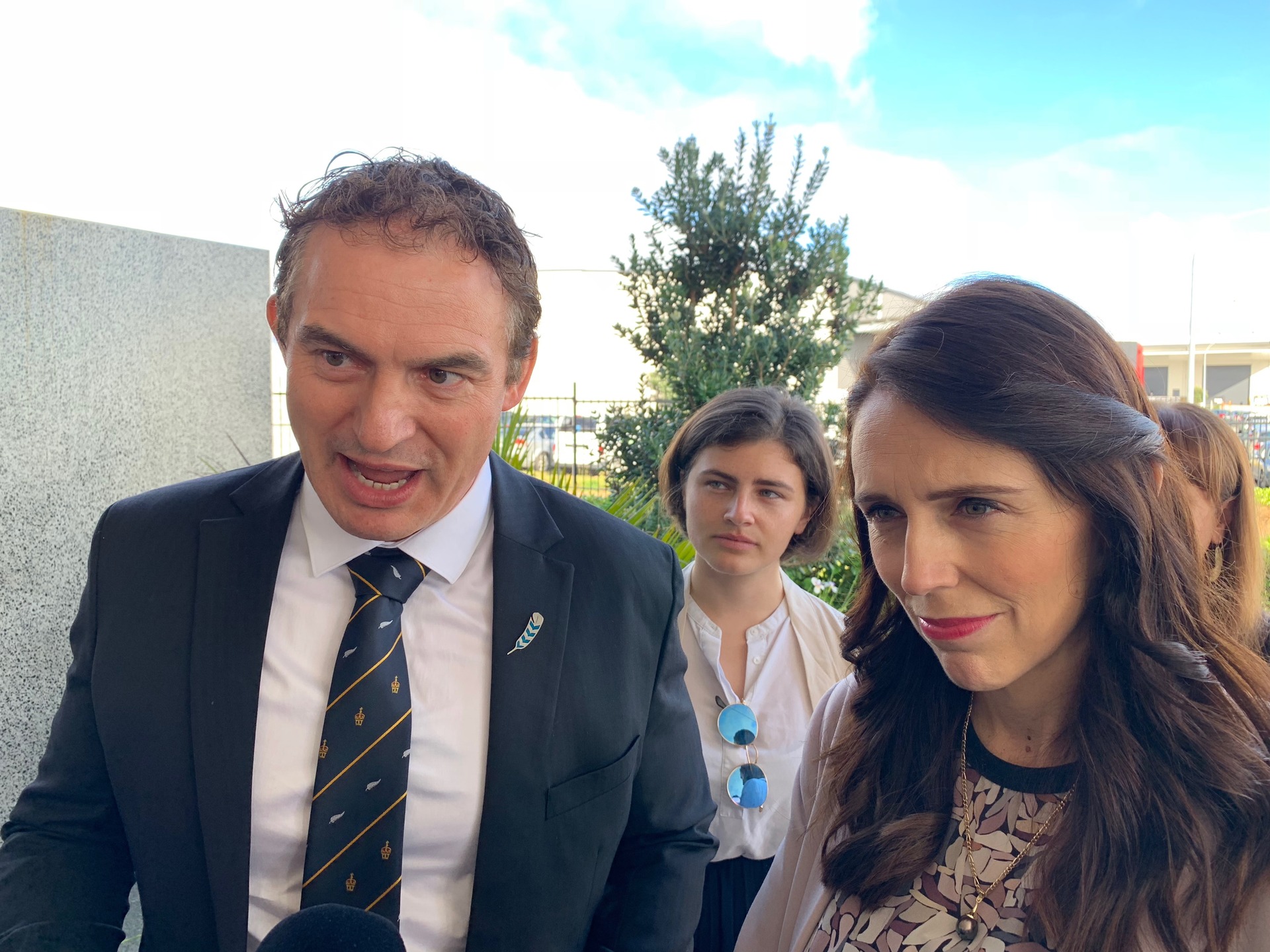 Small Business Minister Stuart Nash, Green Party spokesperson for Small business Chloe Swarbrick and Prime Minister Jacinda Ardern outside Methven. Photo / Chris Keall.