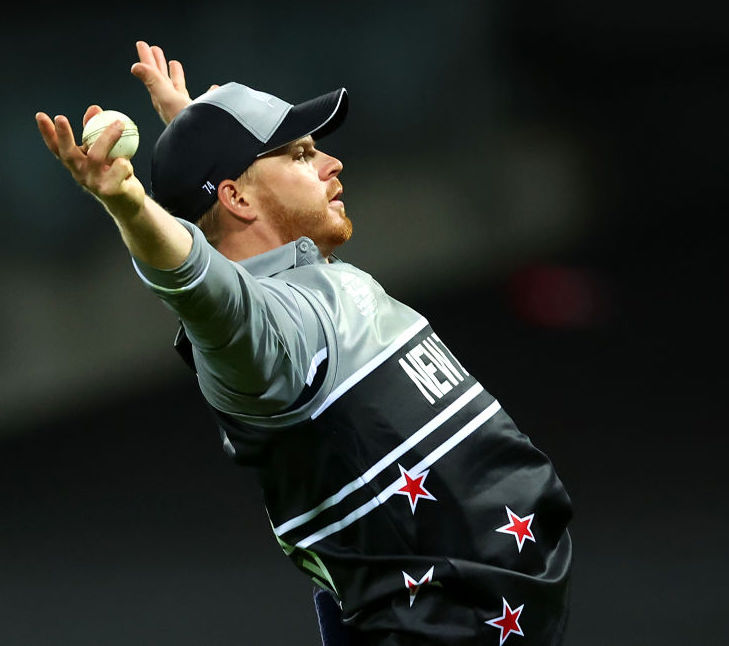 Glenn Phillips of New Zealand celebrates catching out Marcus Stoinis of Australia during the ICC Men's T20 World Cup match between Australia and New Zealand at Sydney Cricket Ground. Photo / Getty Images