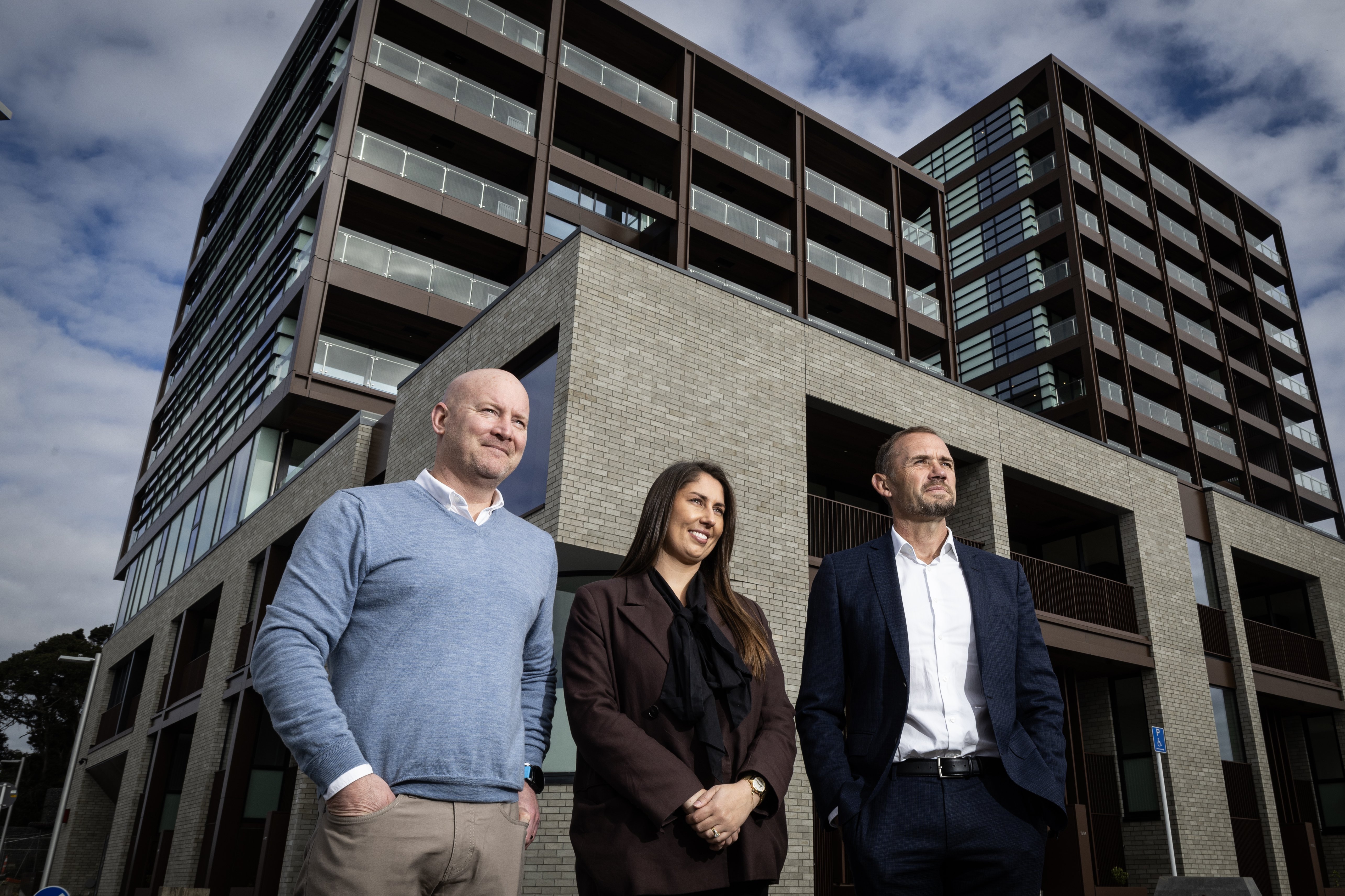 Rohan McKain, Sarah Church and David McGuinness of Willis Bond at the Catalina Bay Apartments. Photo / Jason Oxenham