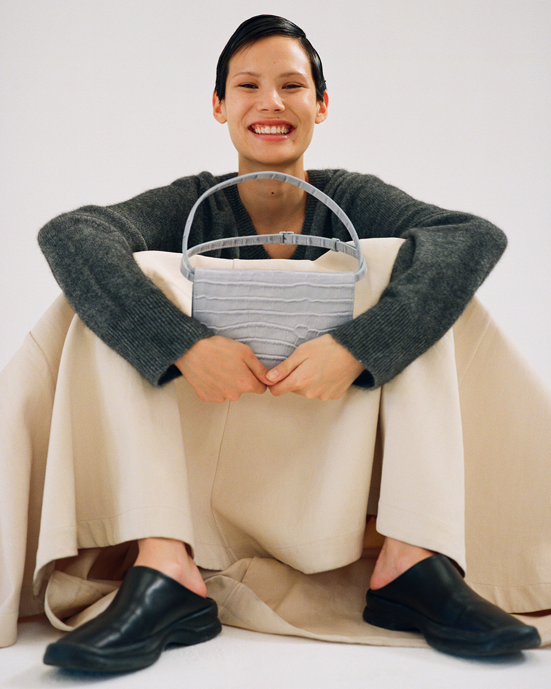The Suki clutch is rendered in a gentle blue croc for Yu Mei’s spring/summer 2024 collection.