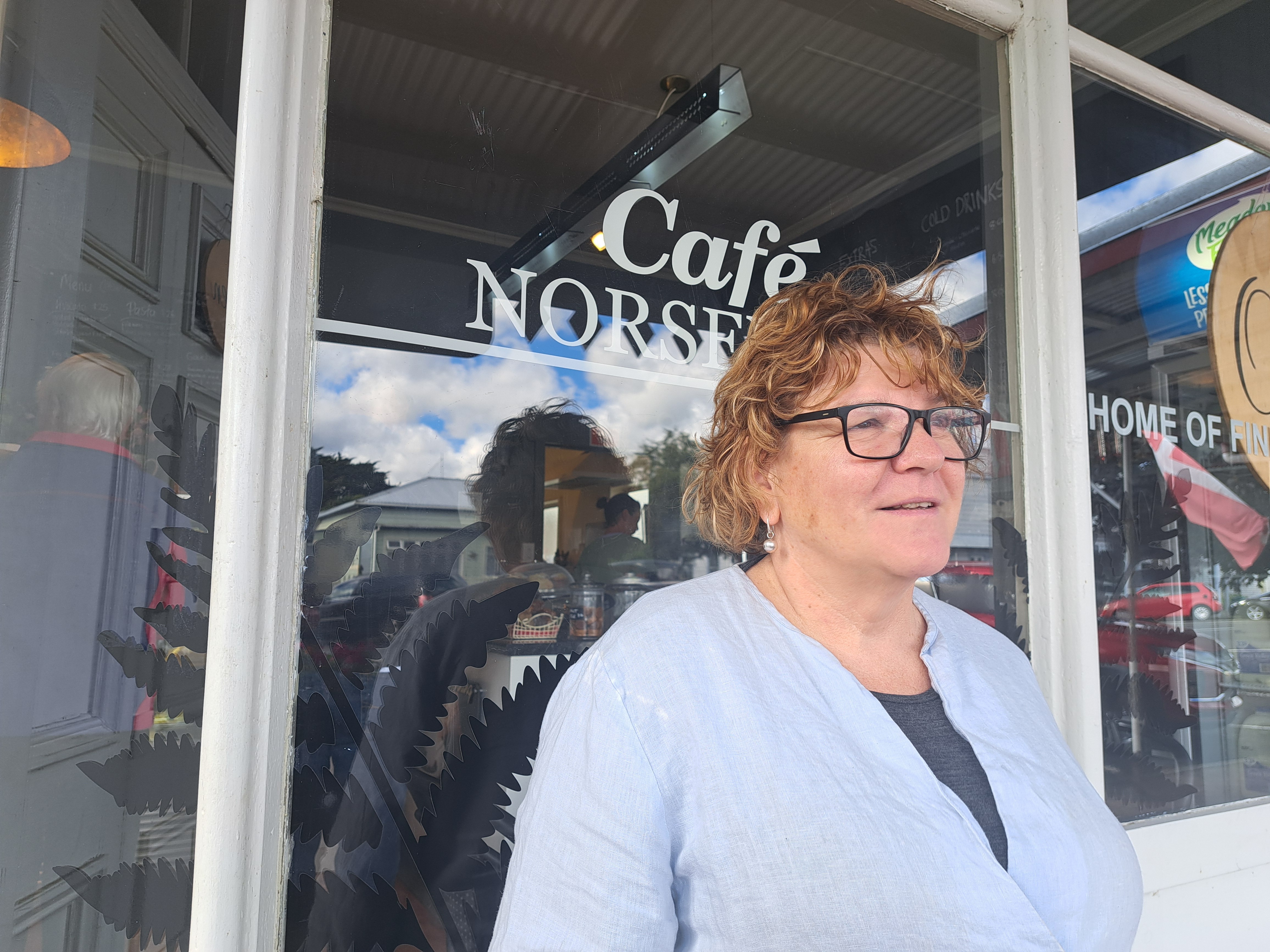 Cafe Norsewood owner Trish Roberts outside her cafe on Norsewood's main road. Photo / Neil Reid