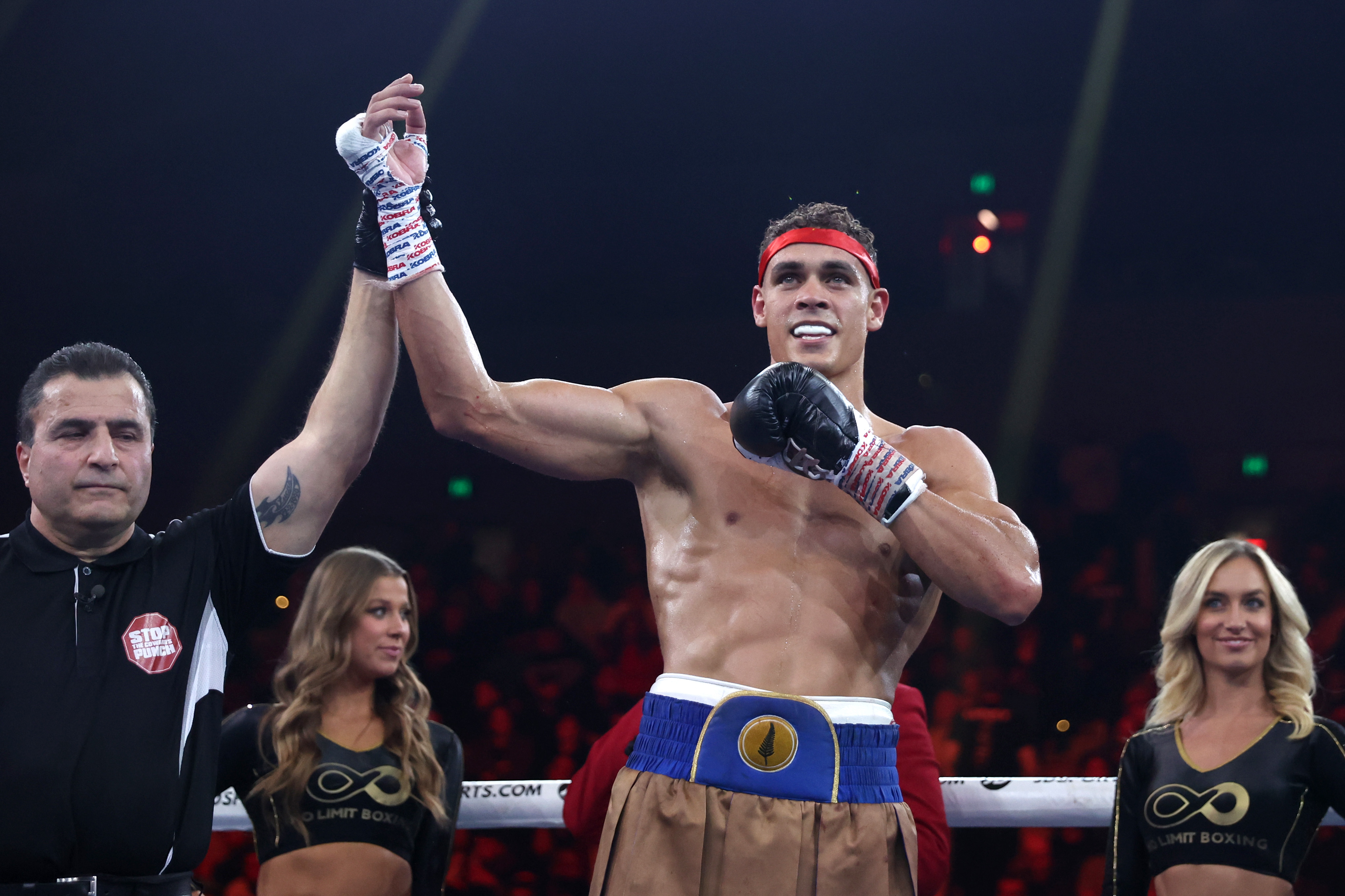 David Nyika celebrates his victory after defeating Louis Marsters at Margaret Court Arena. Photo / Getty Images