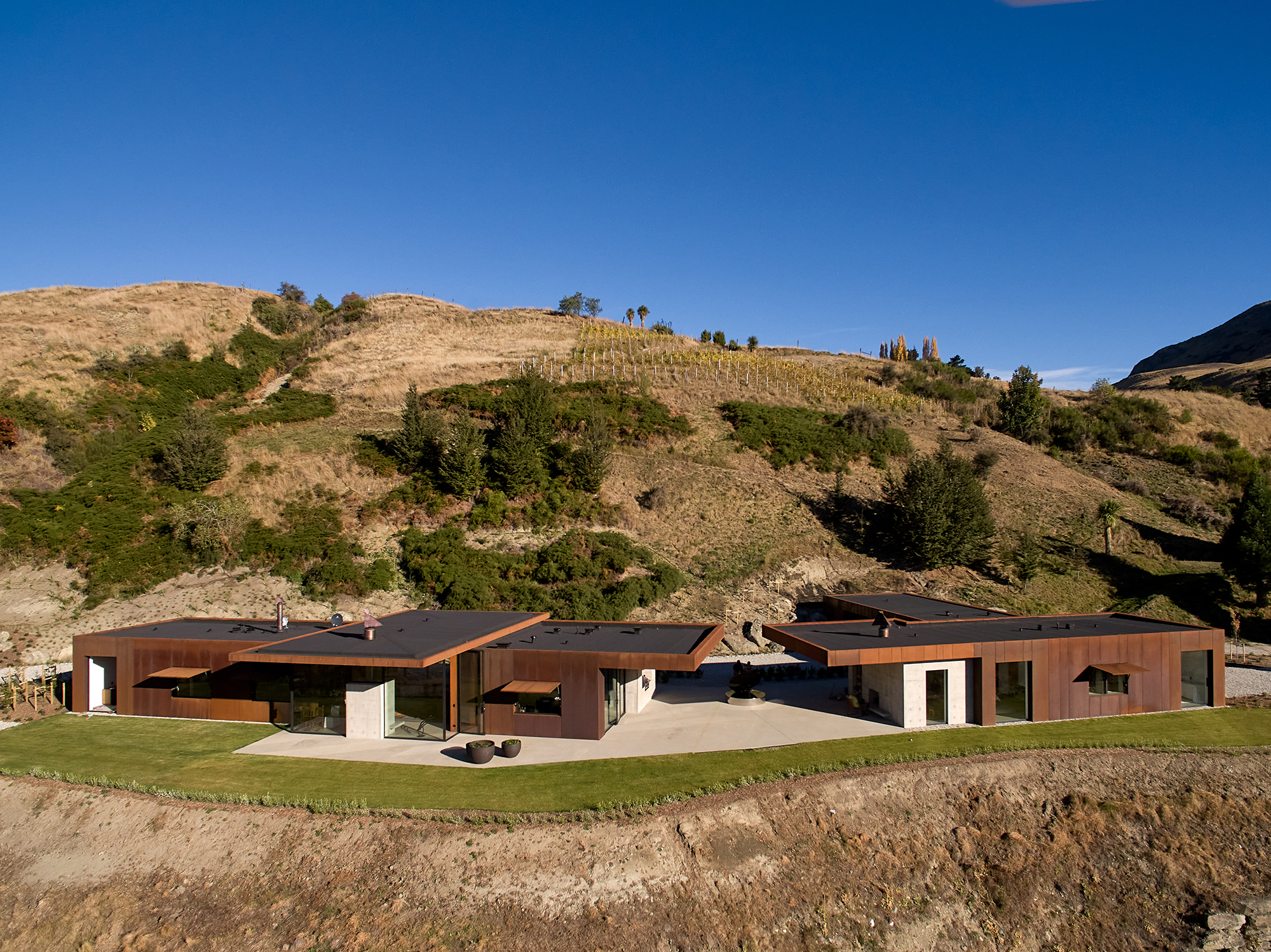 Pouaka Waikura Rust Sheds by Patterson Associates. Photo / Simon Wilson