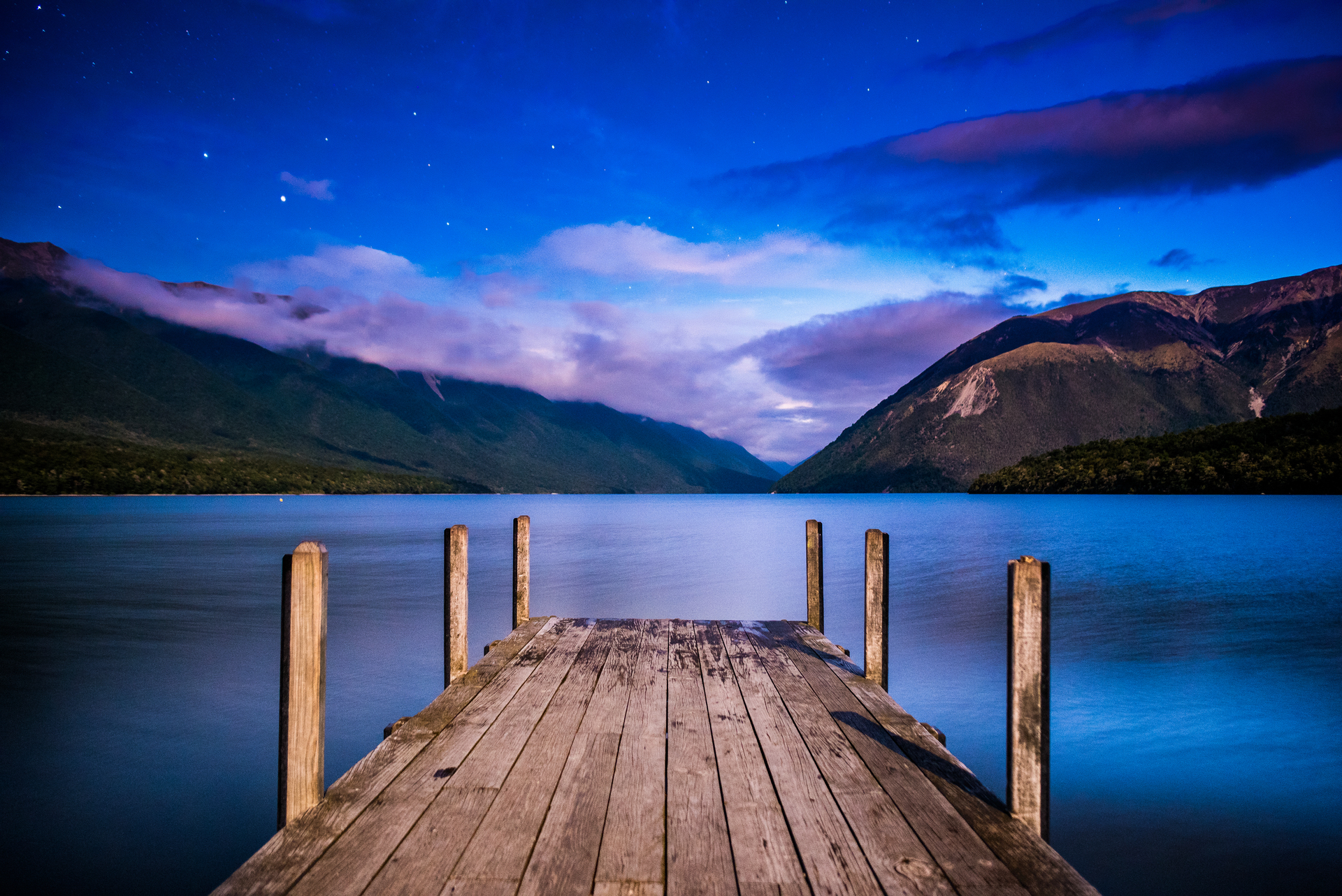The famous jetty at Lake Rotoiti, Nelson Lakes, is a great spot for watching the night sky. Photo / Getty Images