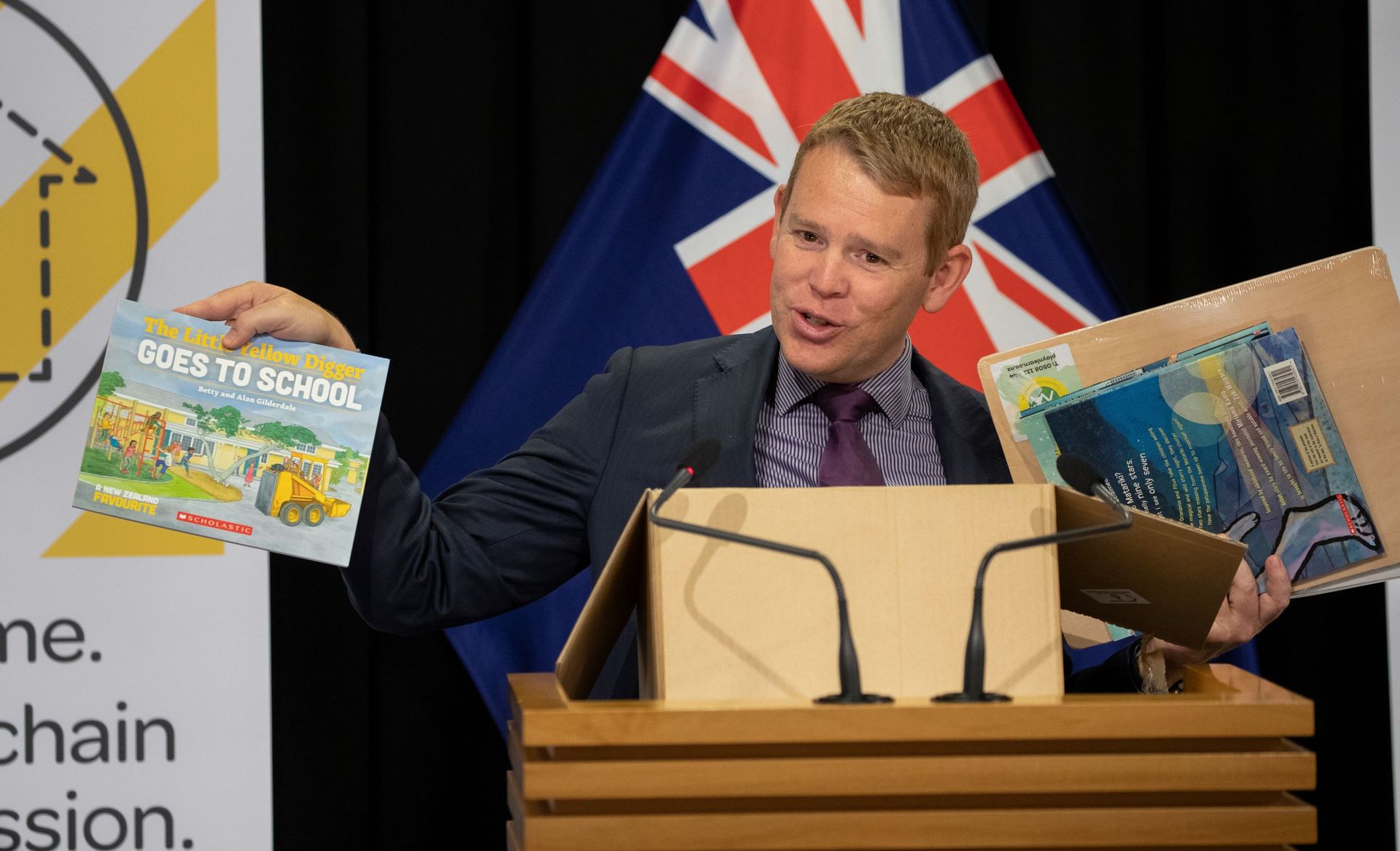 Then Covid-19 Minister Chris Hipkins shows off at-home education packs for lockdowns. Photo / Mark Mitchell