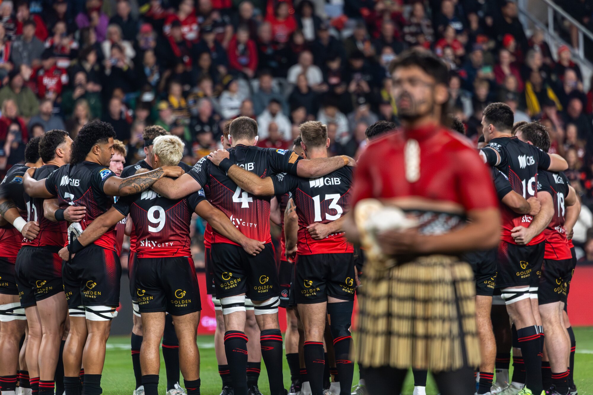 Crusaders players prepare for the opening match at the new Christchurch stadium. Photo / Alyse Wright 