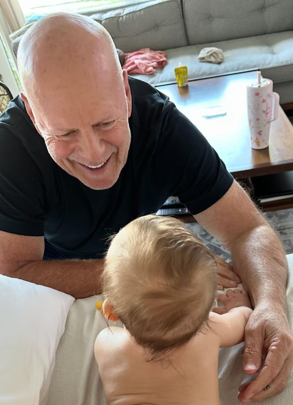 Demi Moore posted an image on Instagram of her ex Bruce Willis playing with his granddaughter Louetta who is the first child of his their daughter Rumer. Photo / demimoore, Instagram