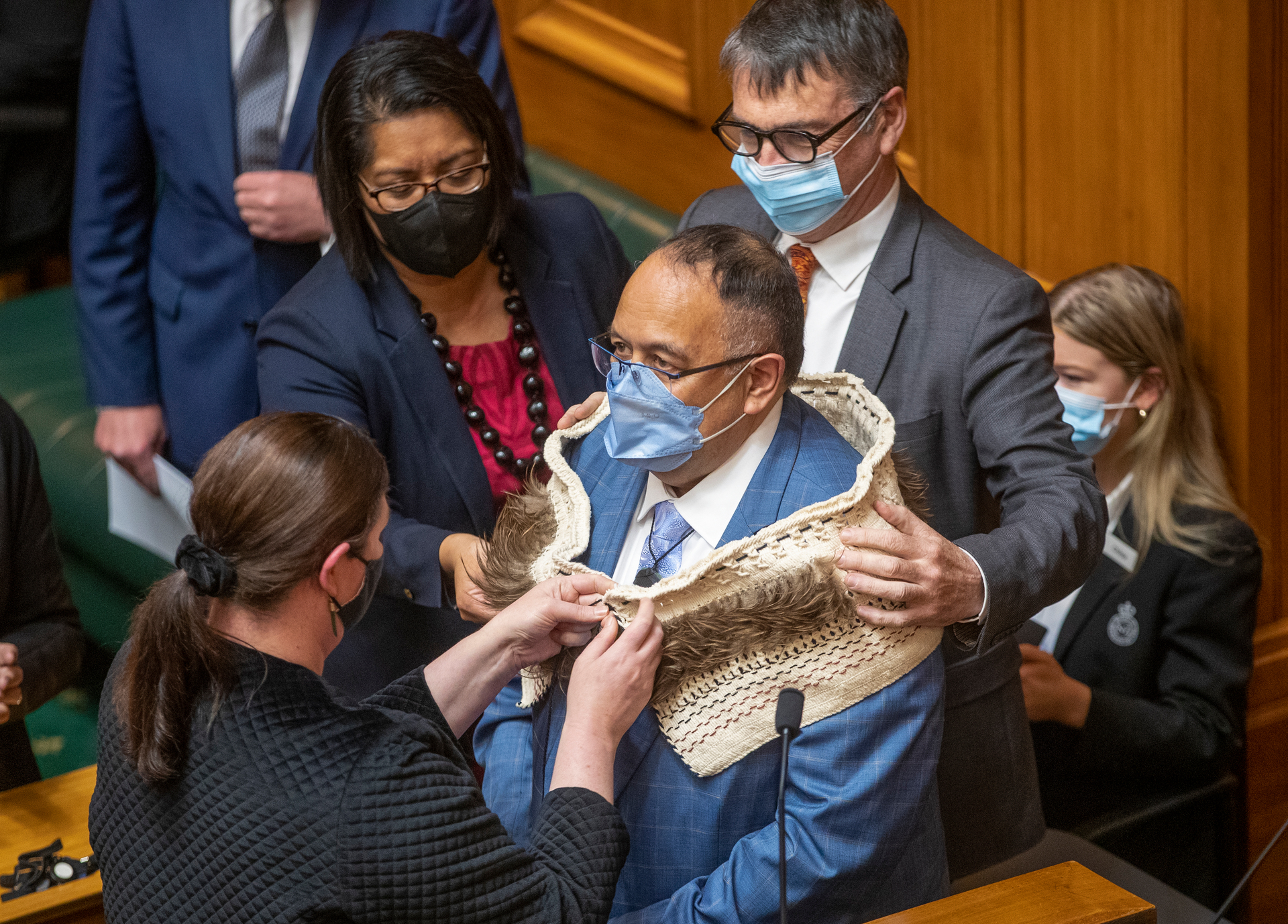 Adrian Rurawhe being adorned in the customary garb as Speaker of the House. Photo / Mark Mitchell