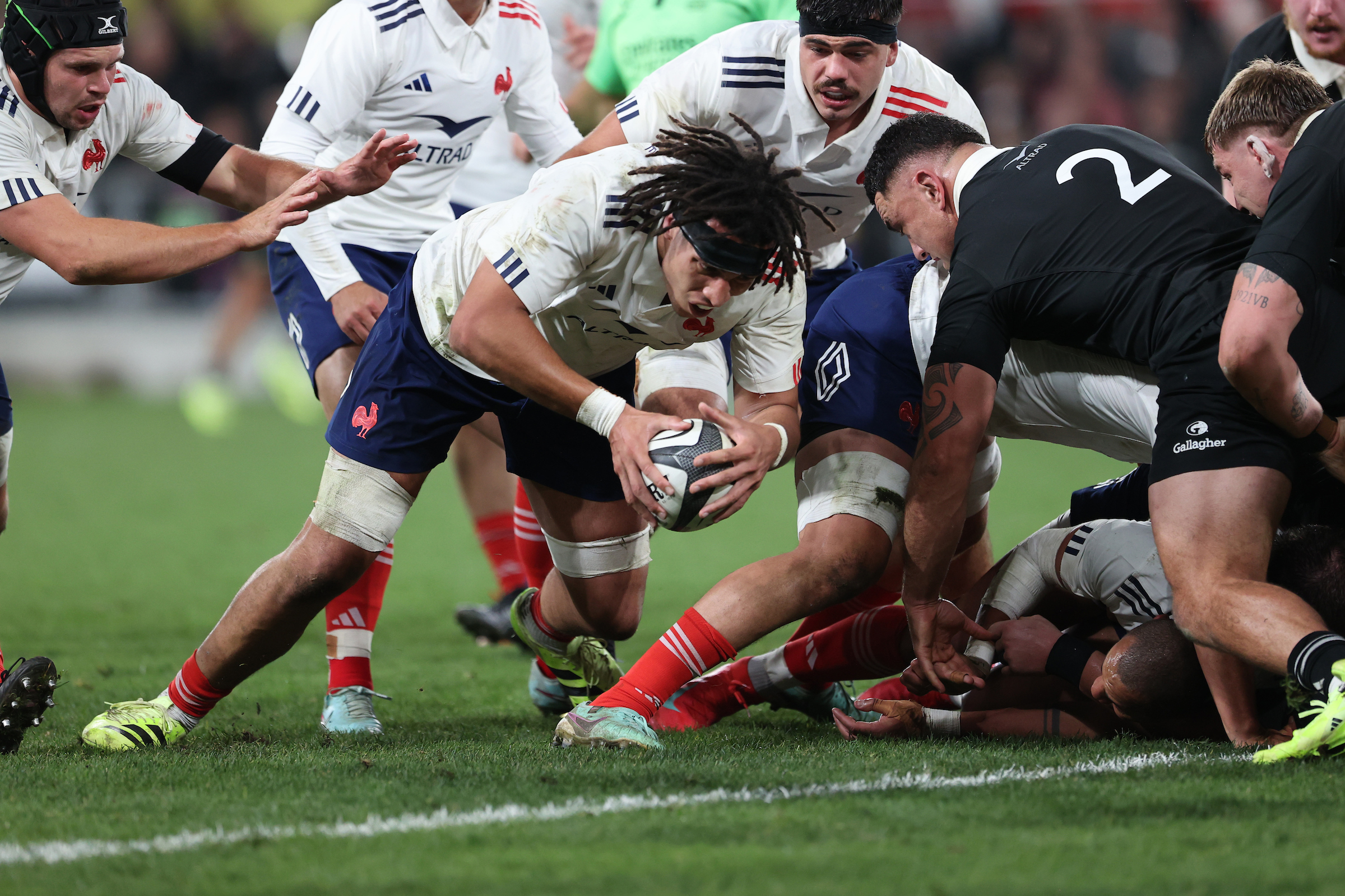 Mickael Guillard dives over to score the first try during the test against the All Blacks, in Dunedin. Photo / Photosport
