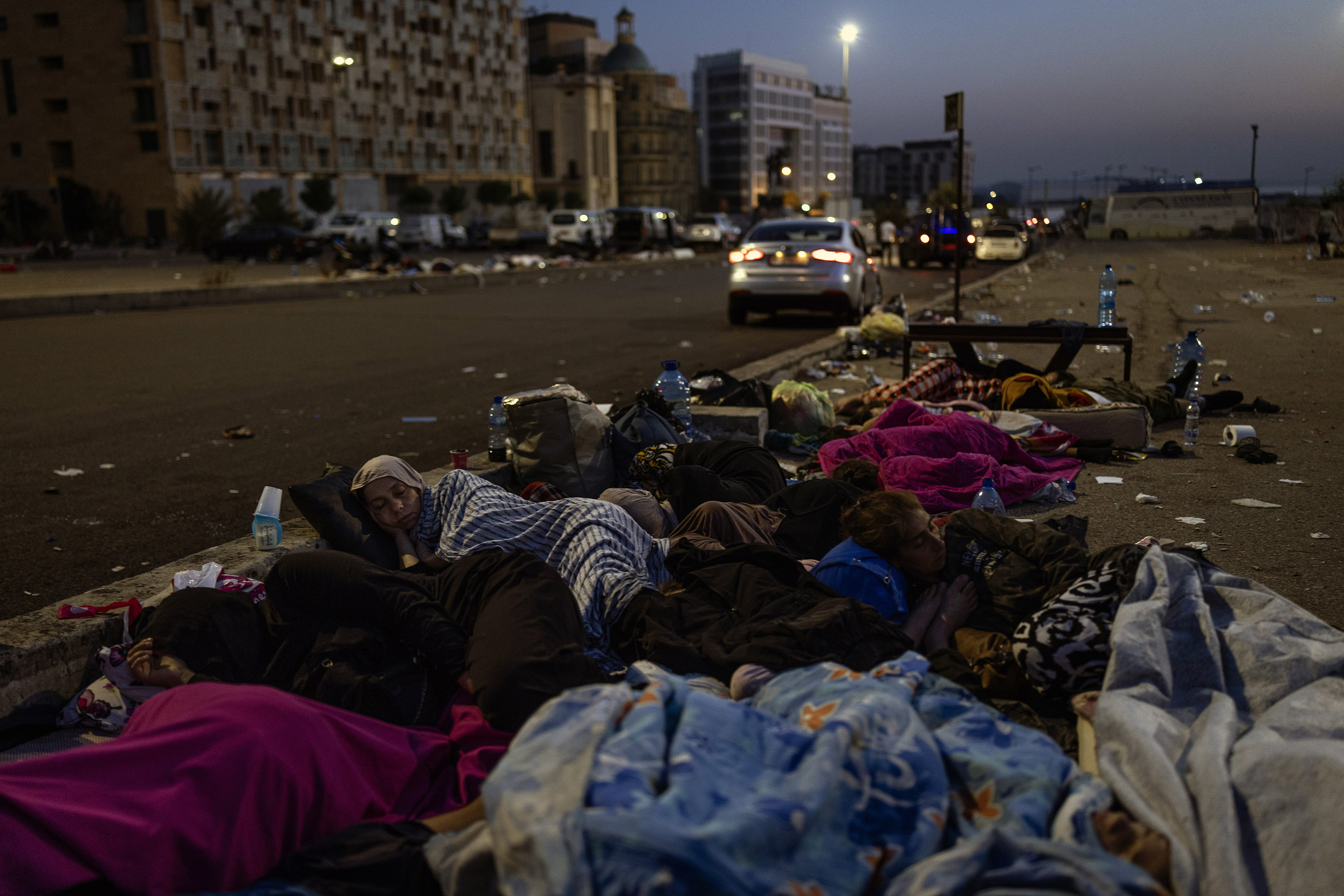 People displaced by fighting sleep in Martyrs' Square in central Beirut. Photo / Diego Ibarra Sanchez, The New York Times