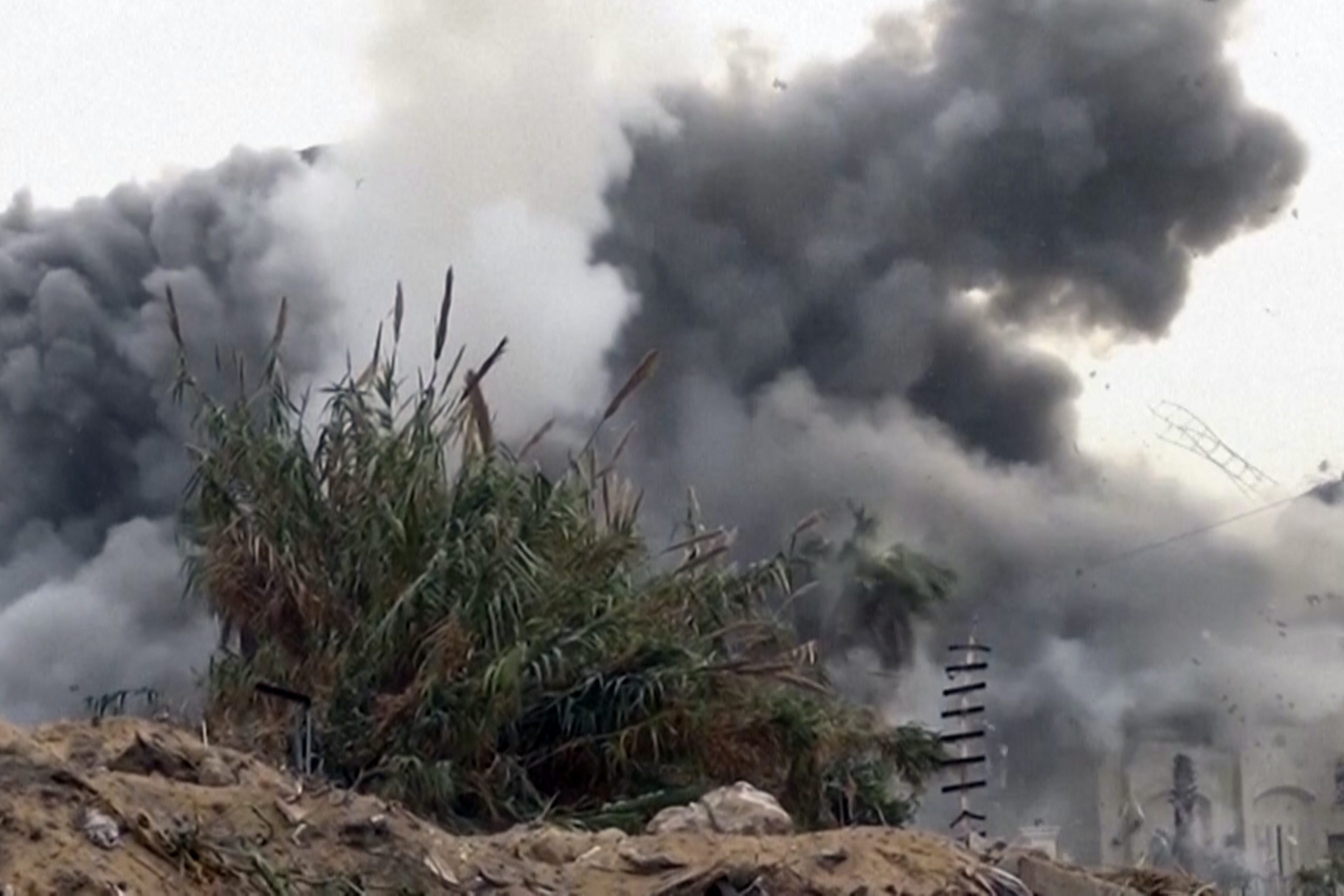 An explosion at a site the Israeli military says is the residence of Hamas leader Ismail Haniyeh in the Gaza Strip. Photo / AP