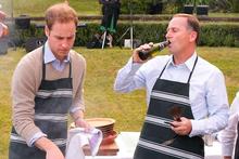 Prince William attends a barbecue at Premier House with John Key. Photo / Getty Images