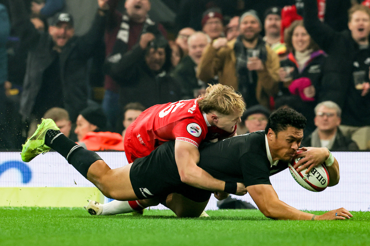 All Blacks wing Caleb Clarke scores against Wales in Cardiff. Photo / Photosport