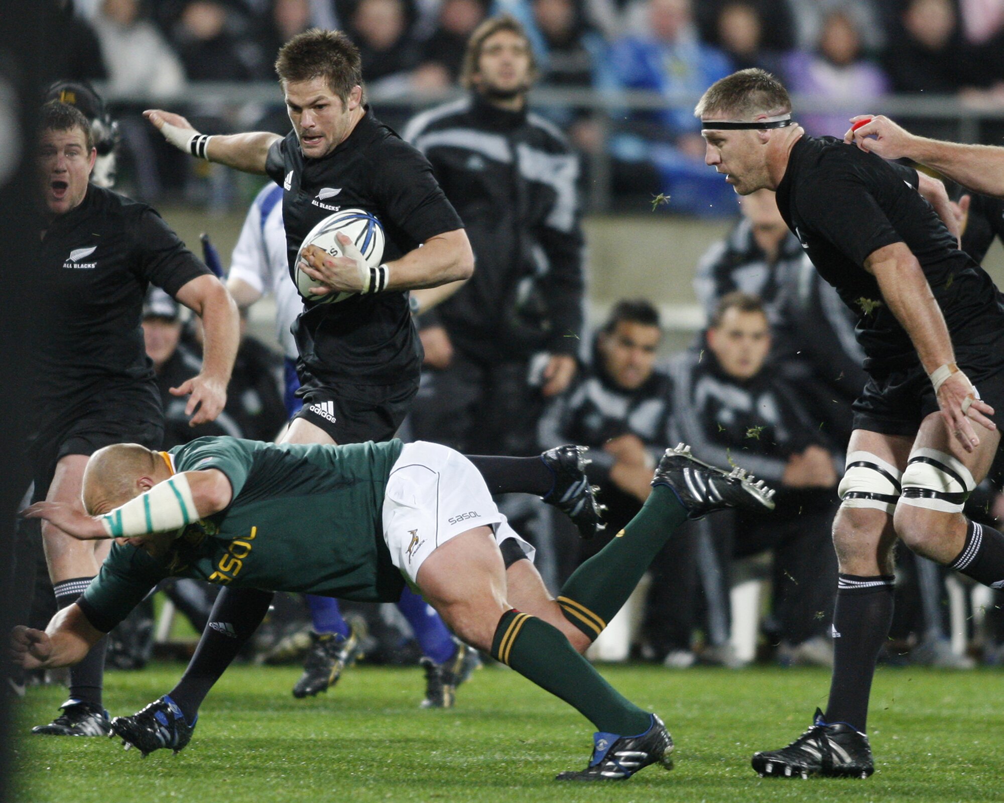 The All Blacks captain Richie McCaw leads his team on attack against the Springboks, in Wellington. Photo / Mark Mitchell