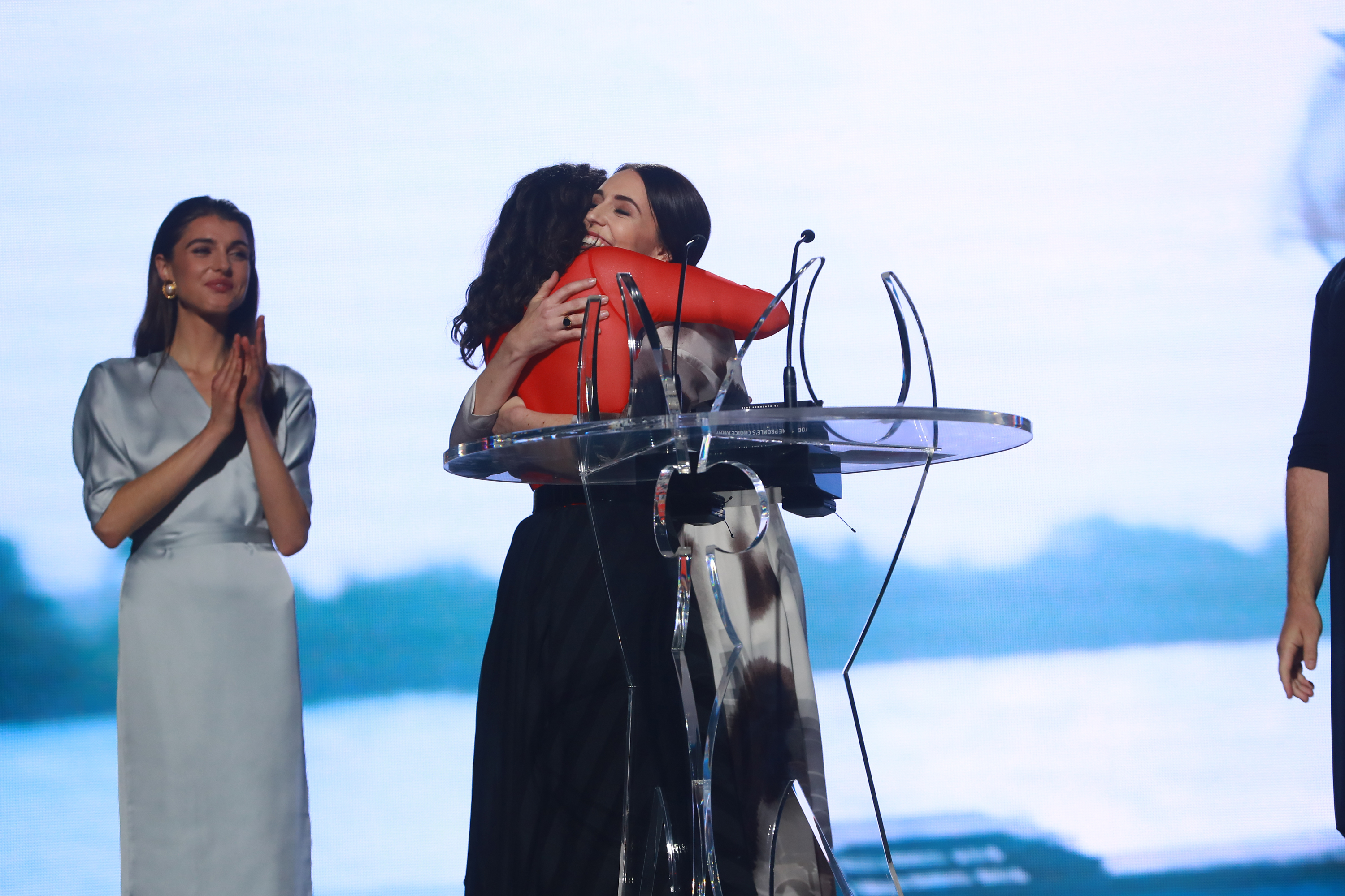 Jacinda Ardern and Lorde embrace on stage after the then-Prime Minister presented the Grammy-winning Kiwi singer with the New Zealand Music Awards 2017 People's Choice Award. Photo / Norrie Montgomery