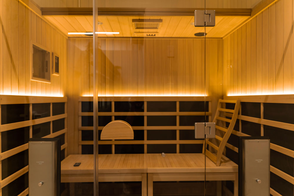 The private sauna rooms come equipped with your own shower, amenities from local hair and skin brand Sans Ceuticals, and plush luxury towels from Baina. Photo / Supplied. 