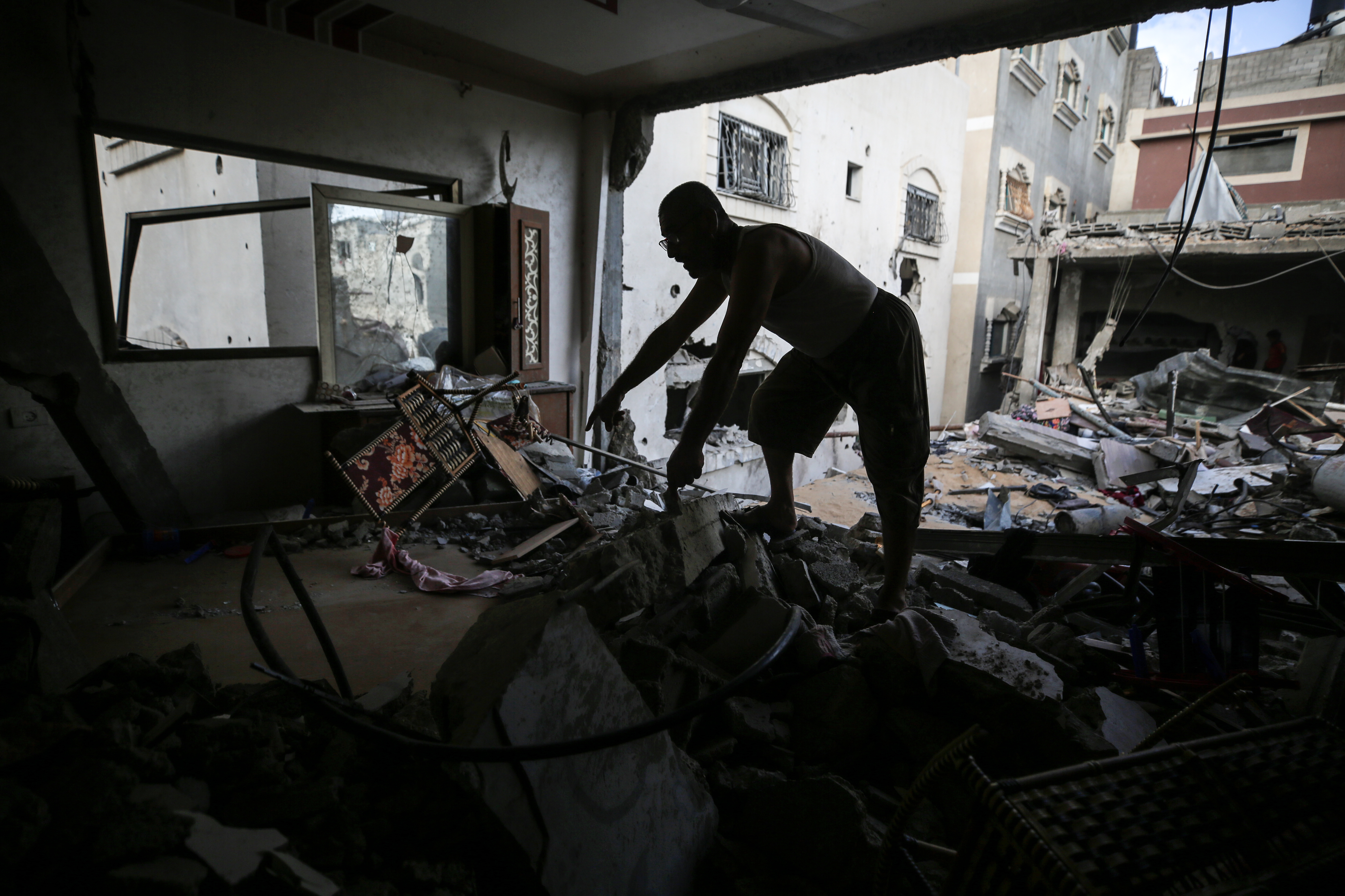 A Palestinian man inspects his home after it was damaged by an Israeli airstrike in Nuseirat in the central Gaza Strip on September 16, 2024 amid the ongoing war between Israel and the militant group Hamas. Photo / Getty Images