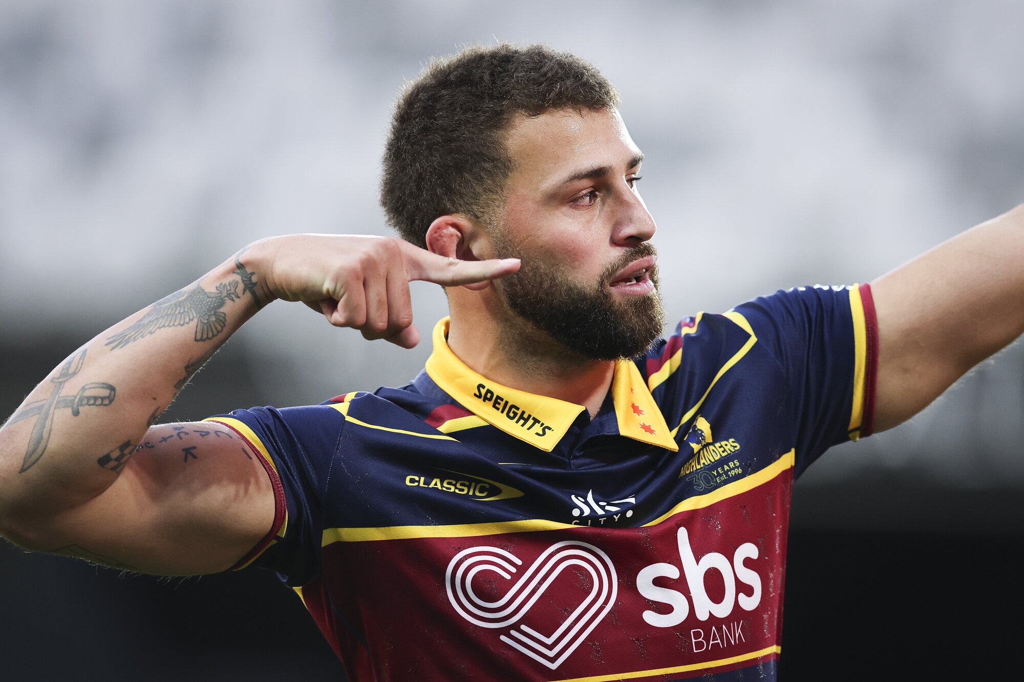 Highlanders fullback Jacob Ratumaitavuki-Kneepkens celebrates after scoring the opening try against the Hurricanes. Photo / SmartFrame