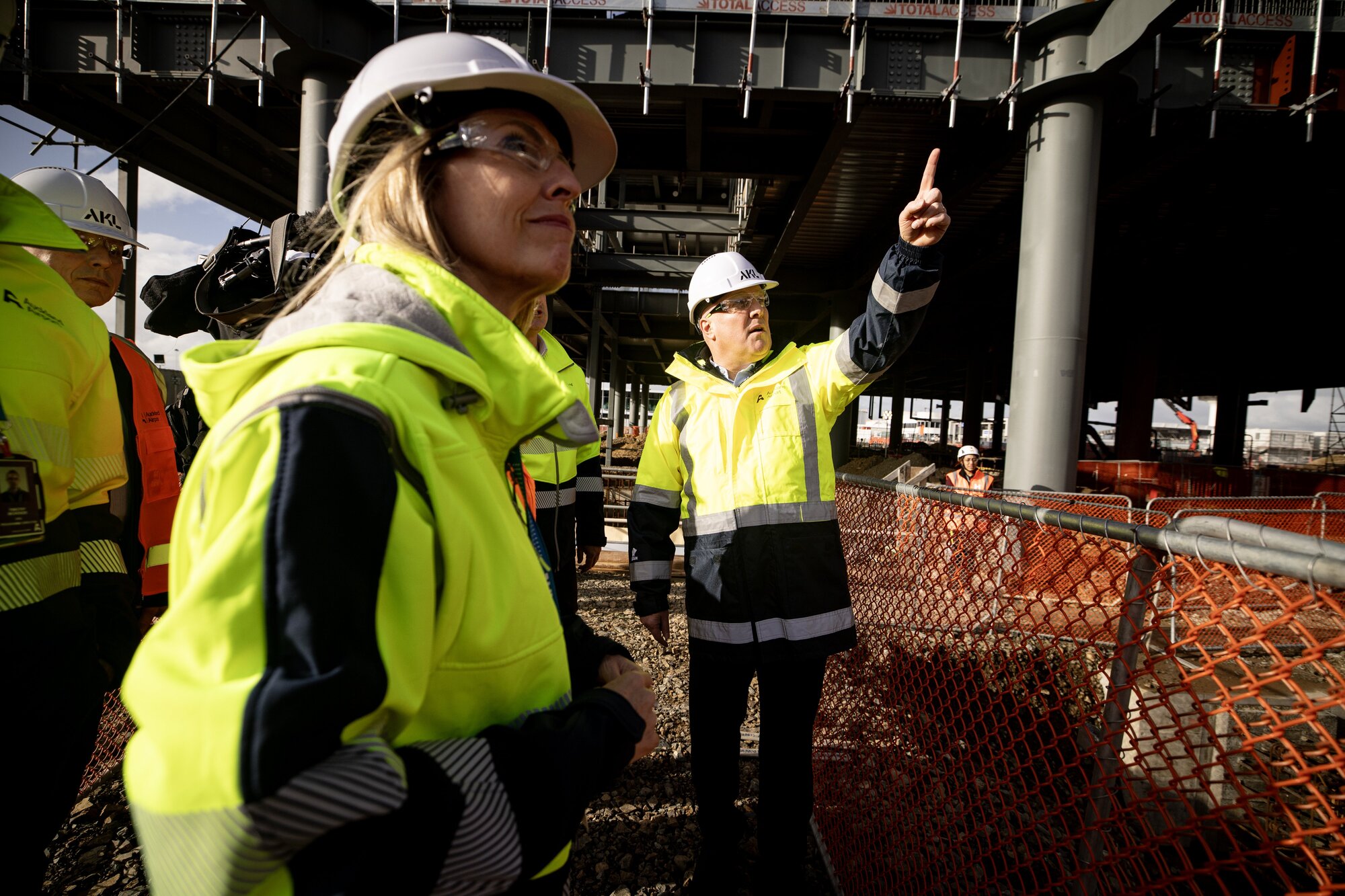 Carrie Hurihanganui, left, with Prime Minister Christopher Luxon on a tour of Auckland International Airport’s integrated terminal build site last year. Photo / Dean Purcell