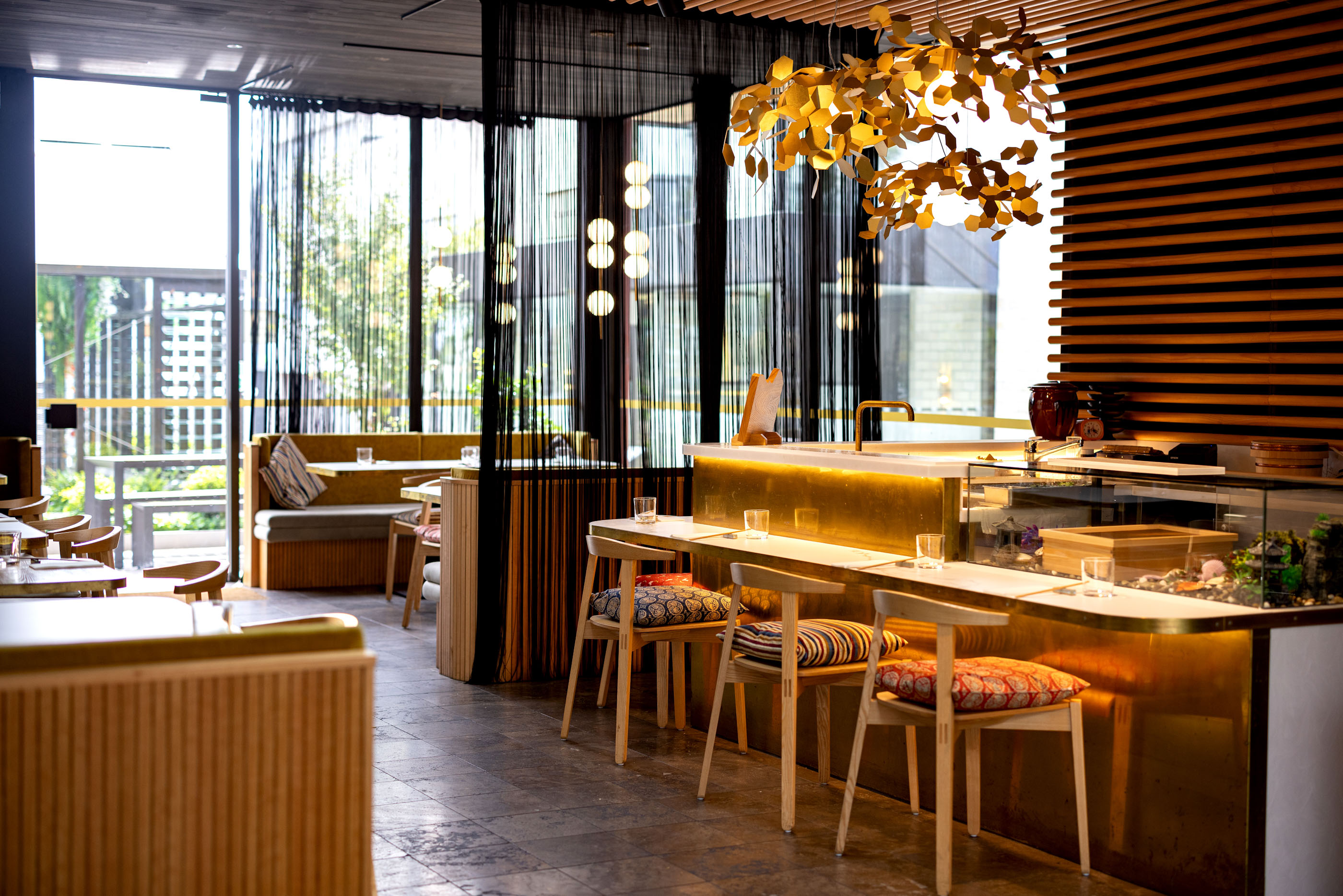 Wakuwaku’s new glass-walled dining pavilion is delineated by floor-length black curtains. Photo / Babiche Martens