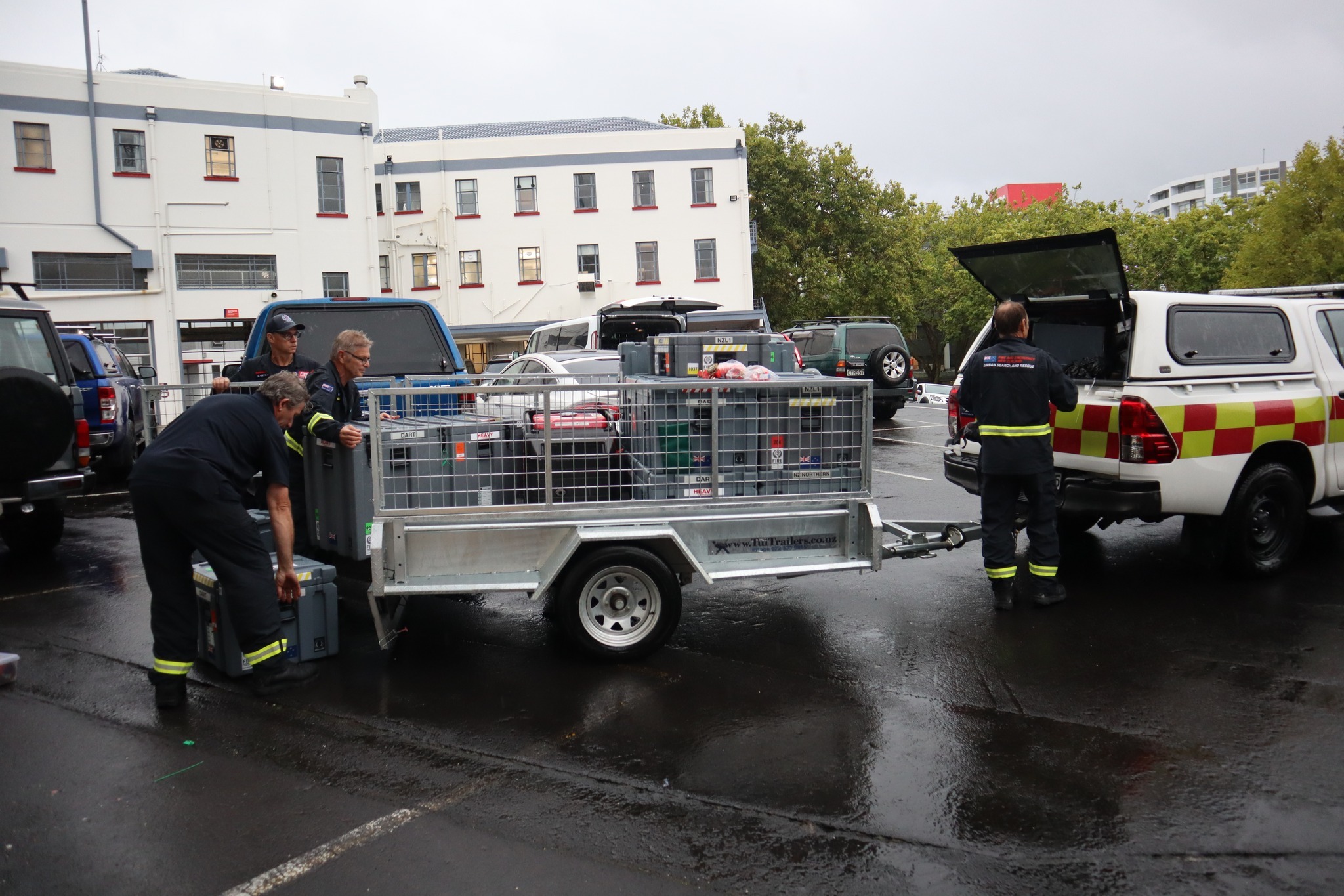 Members of the team packing their gear in Auckland this morning. Photo / Fire and Emergency