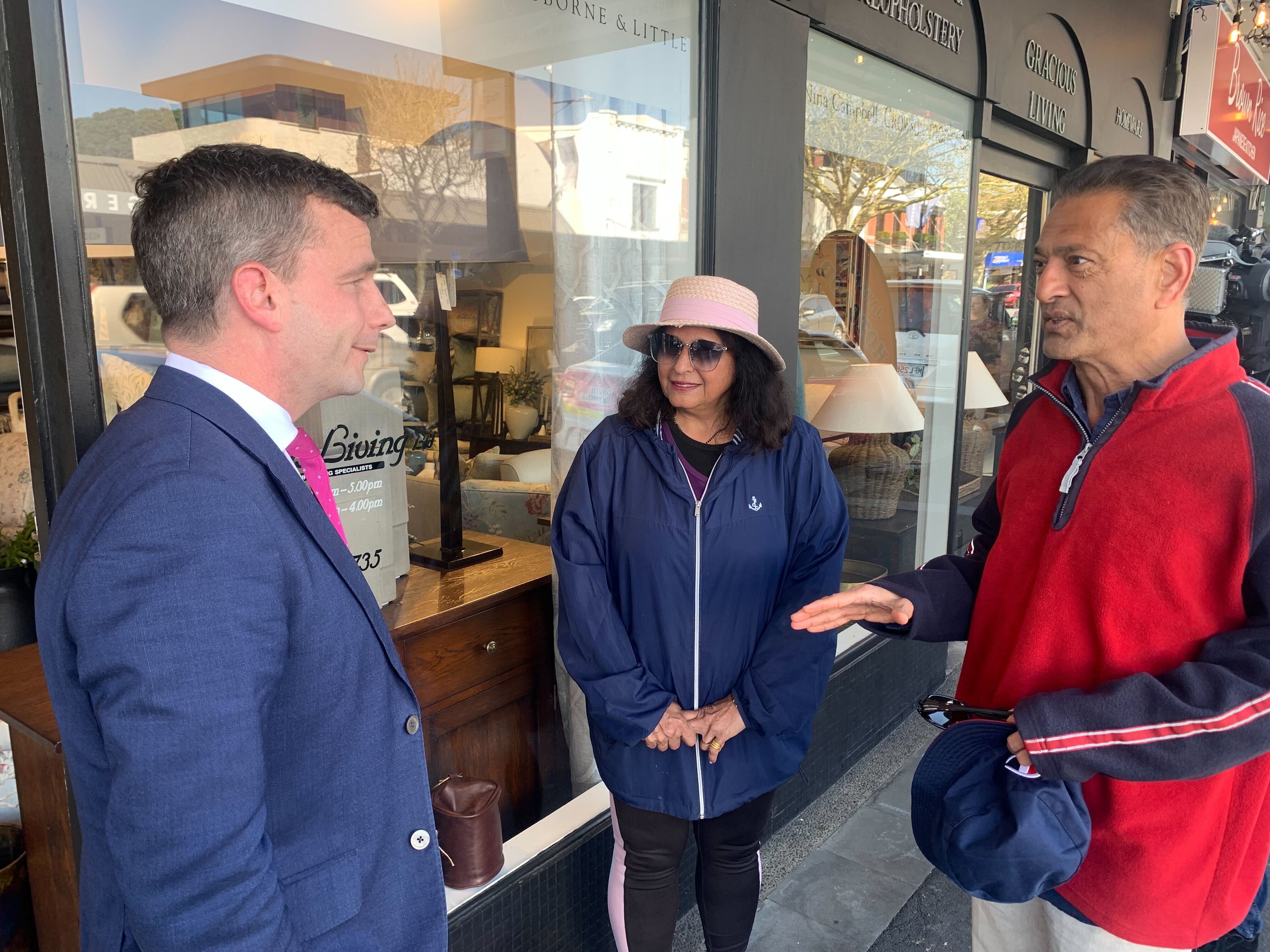 A retired couple stop and speak with Act Party leader David Seymour during his walkabout. Photo / Adam Pearse